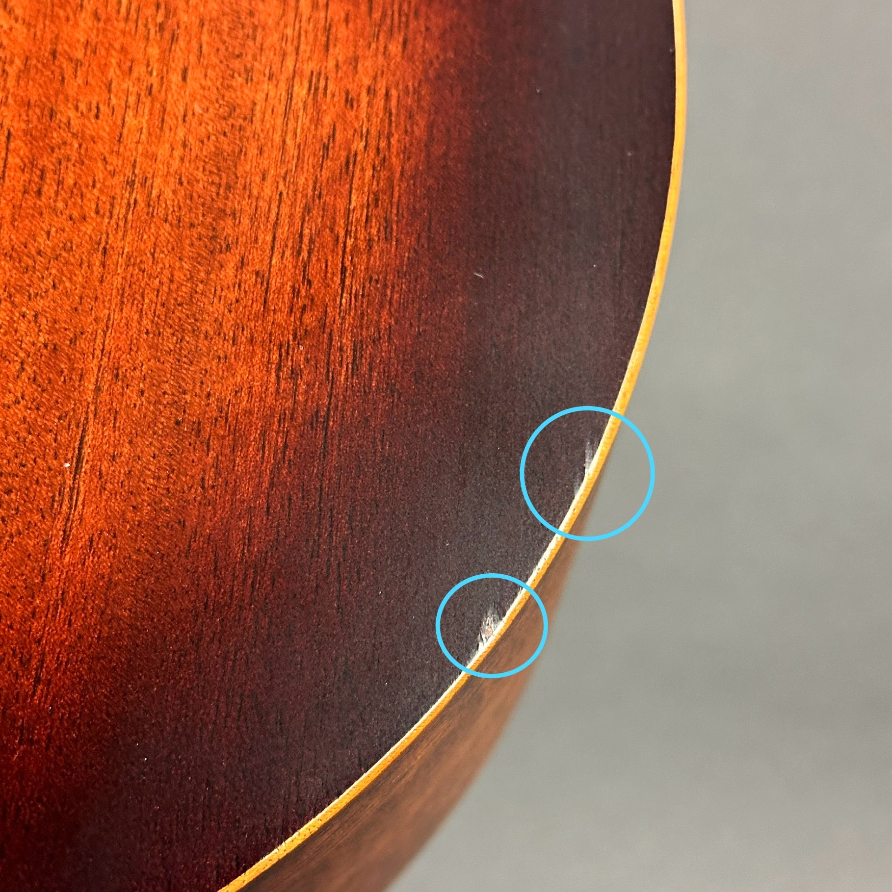 Mark on bottom edge of Used Martin 000-15M Streetmaster.