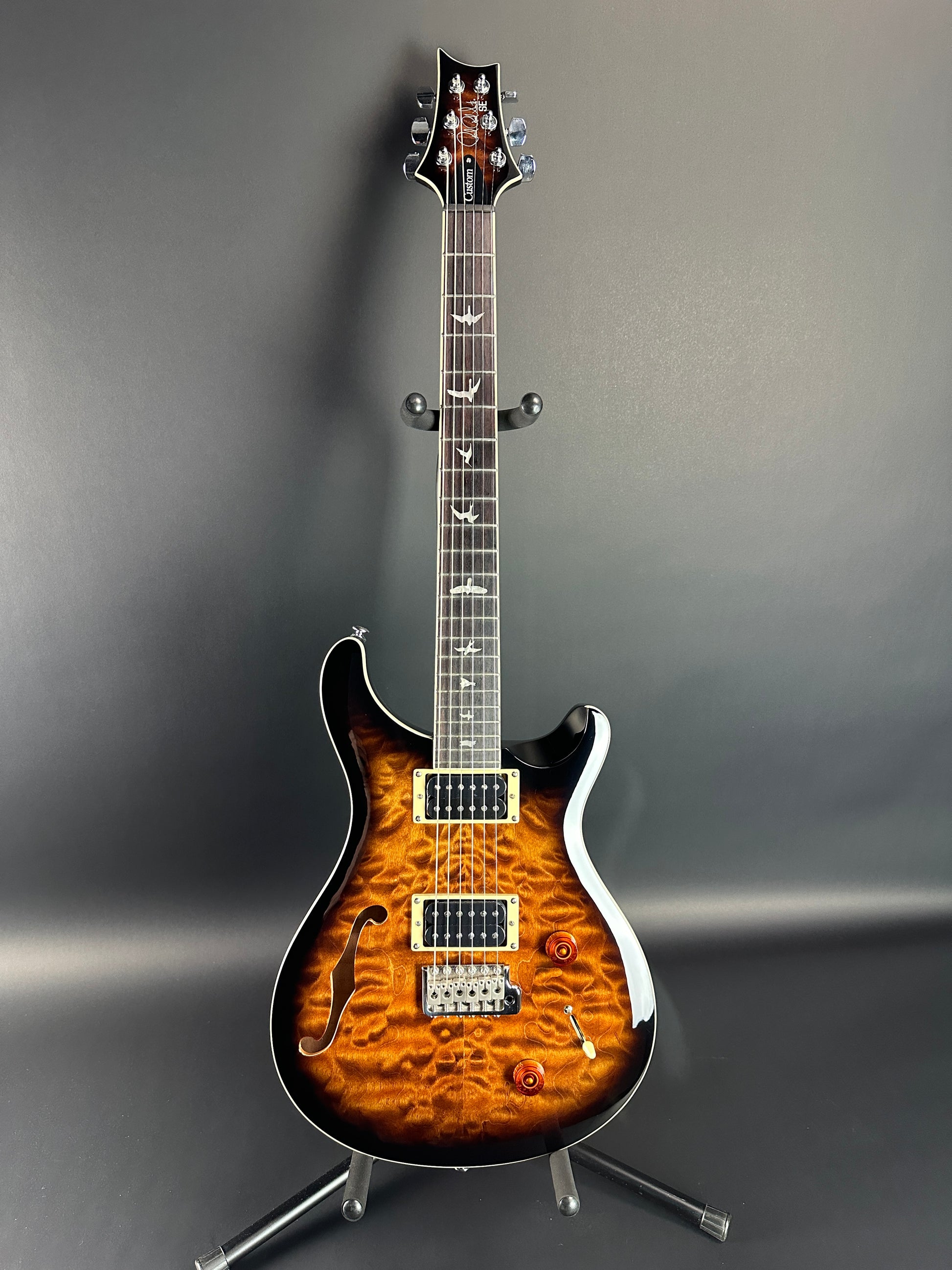 Full front of Used PRS SE Custom 22 Semi-Hollow Black Gold Burst.