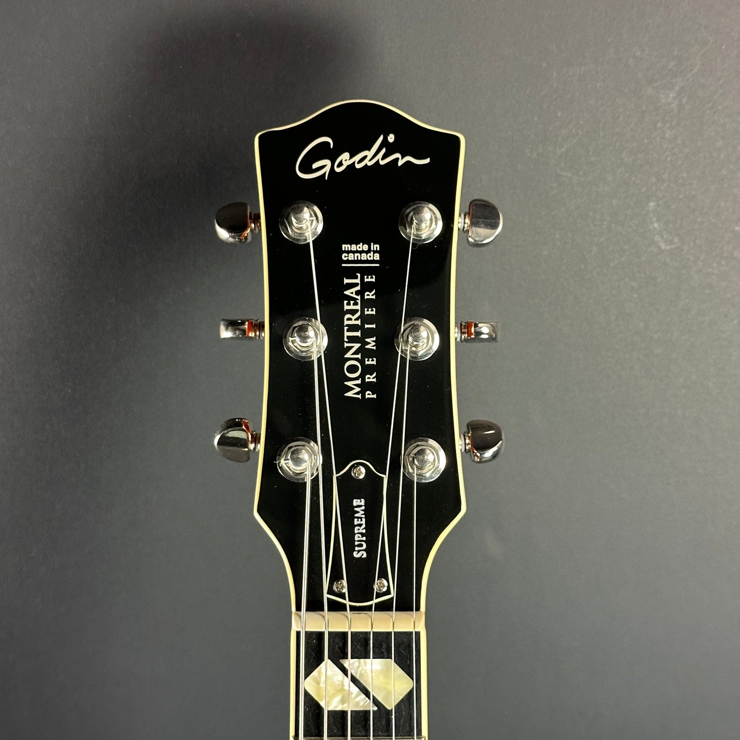 Front of headstock of Used Godin Montreal Premier Supreme.