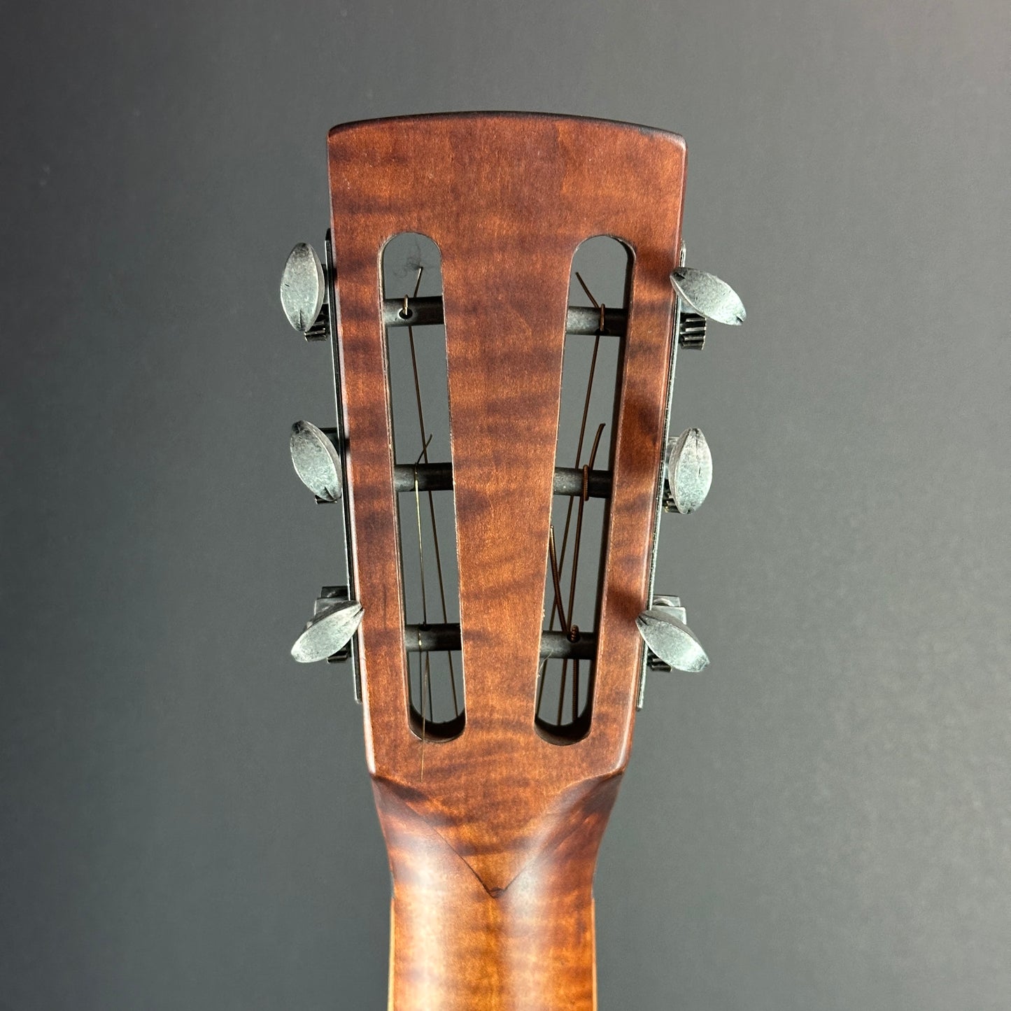 Back of headstock of Used Mule Resonator Guitar.