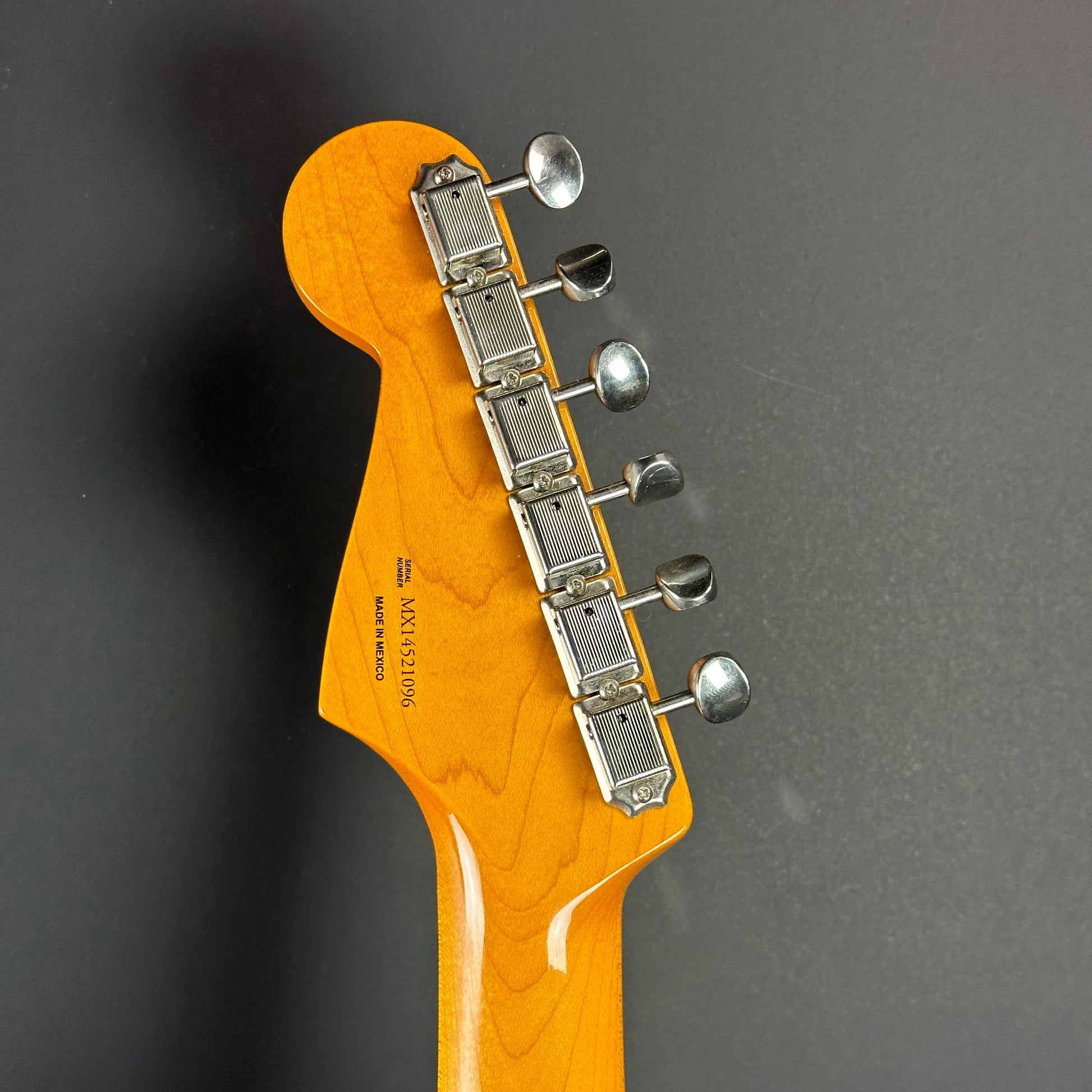 Back of headstock of Used Fender Classic Series '60s Stratocaster 3 Tone Sunburst.