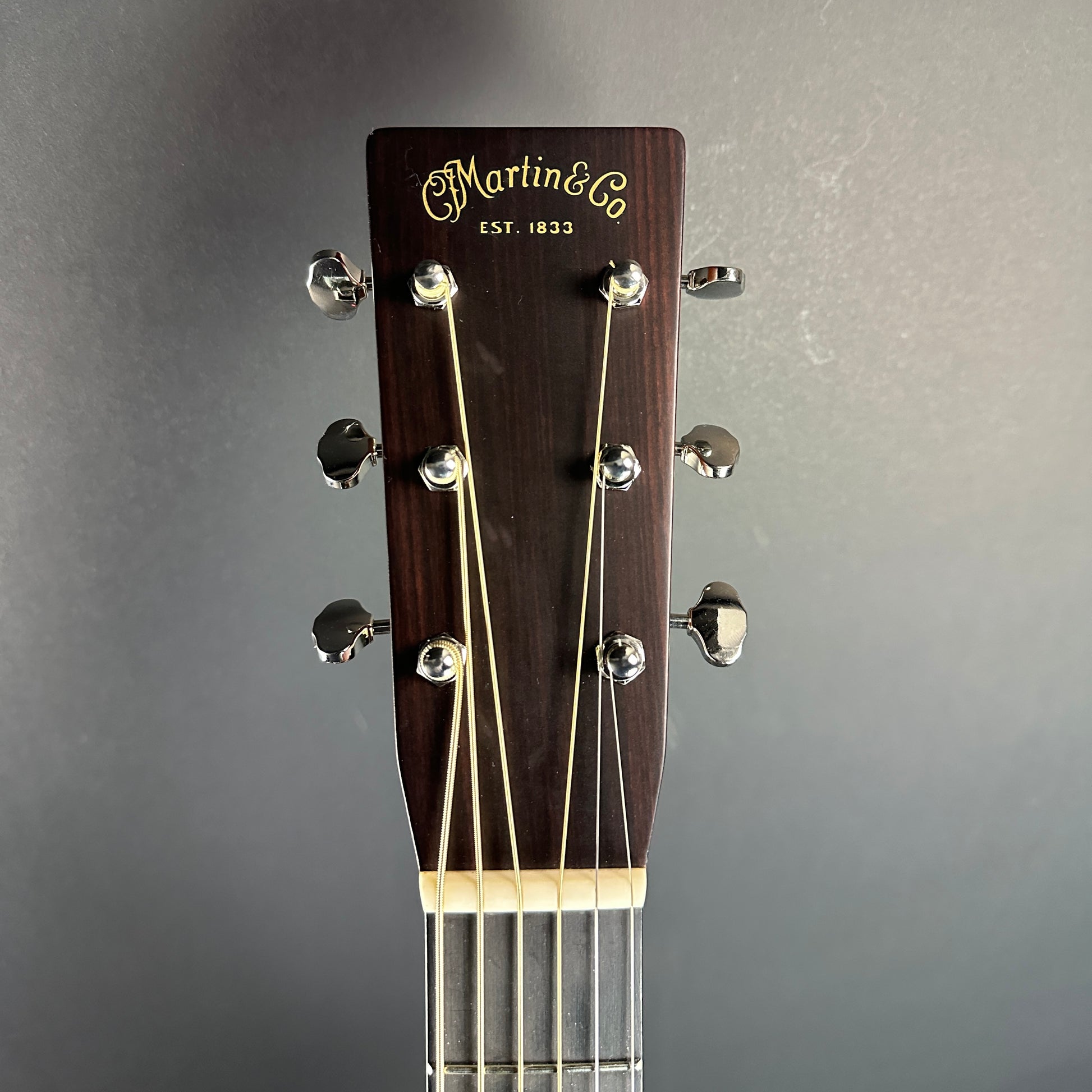 Front of headstock of Used Martin D-28 Sunburst.