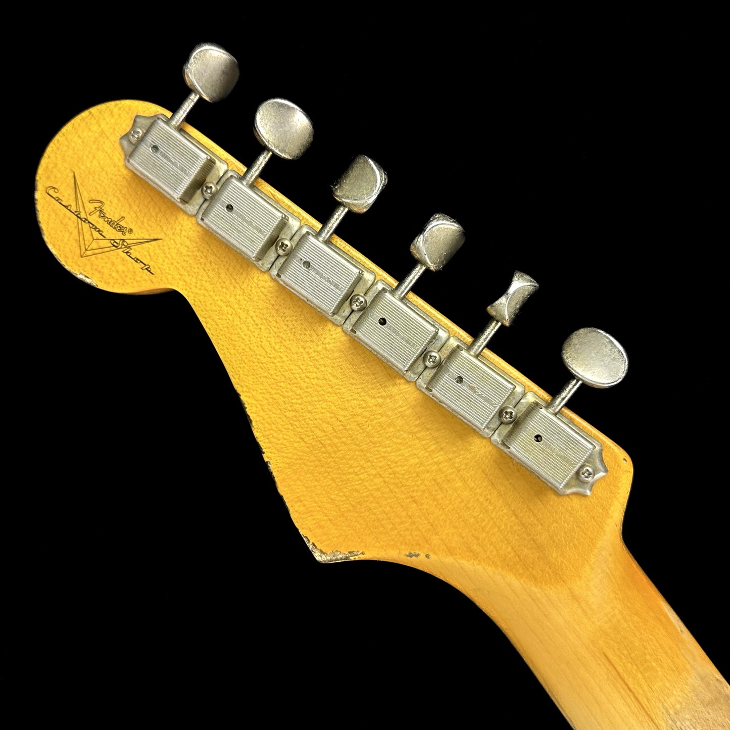 Back of Fender Custom Shop 1961 Strat Heavy Relic Super Faded Aged Sonic Blue/3-Color Sunburst headstock.