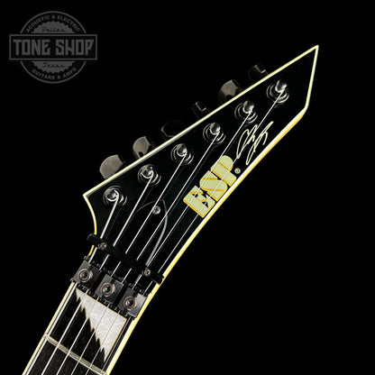 Front of headstock of Used ESP Alexi Laiho Signature Black with Yellow.