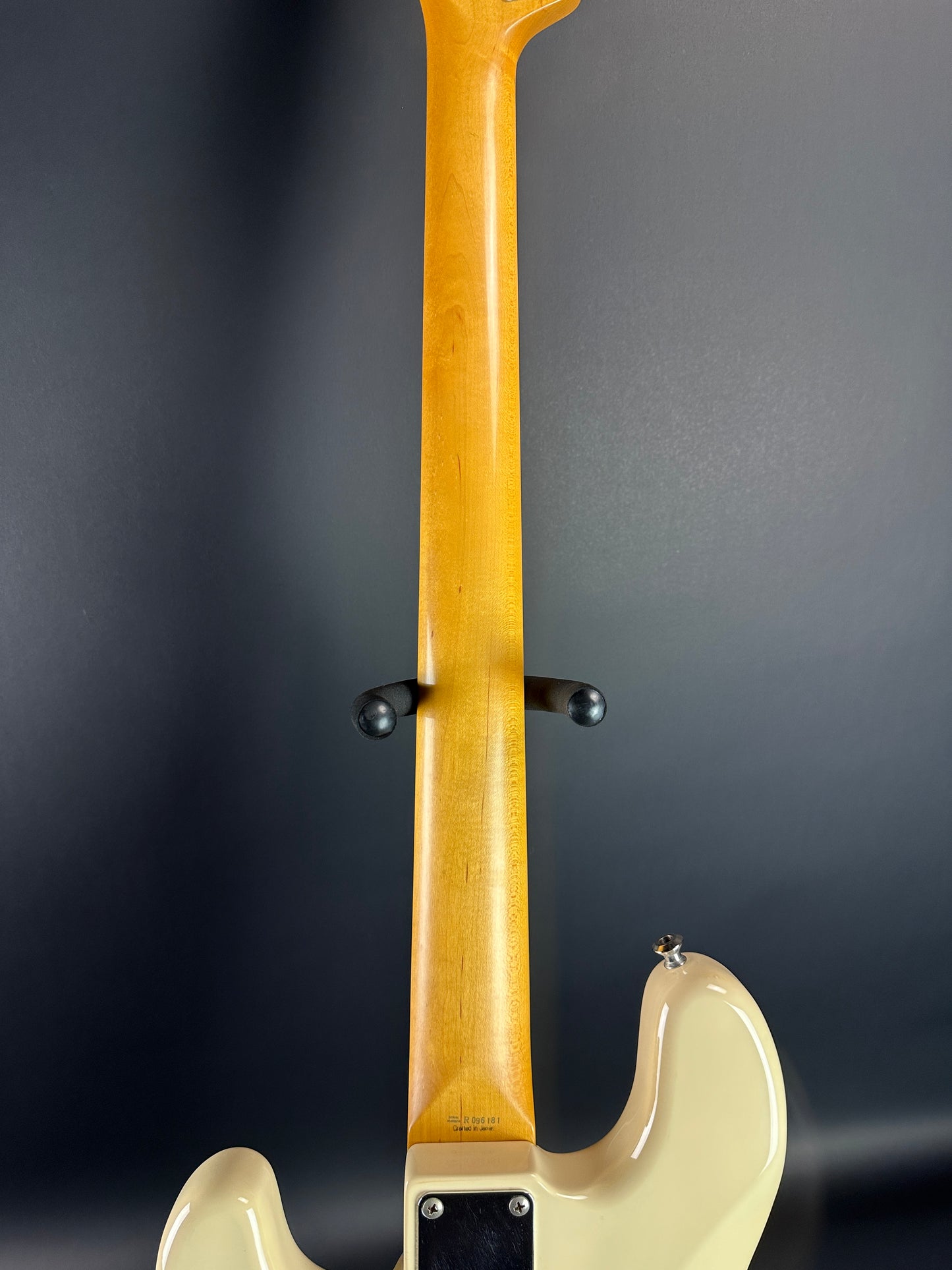 Back of neck of Used Fender CIJ PB-64 Precision Bass Olympic White.