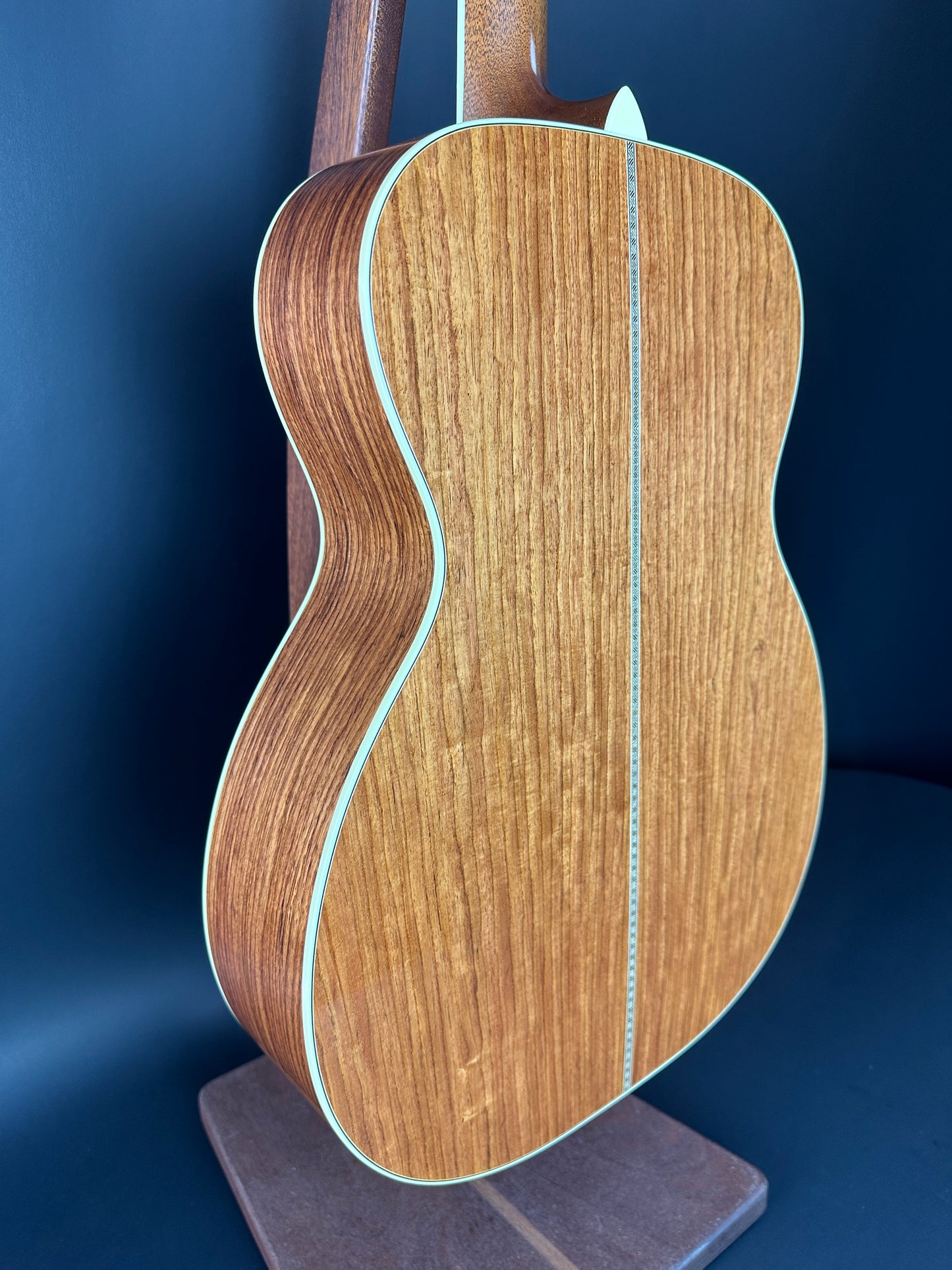 Back angle of Used Bourgeois Panama Red OM Large Soundhole Aged Adirondack.