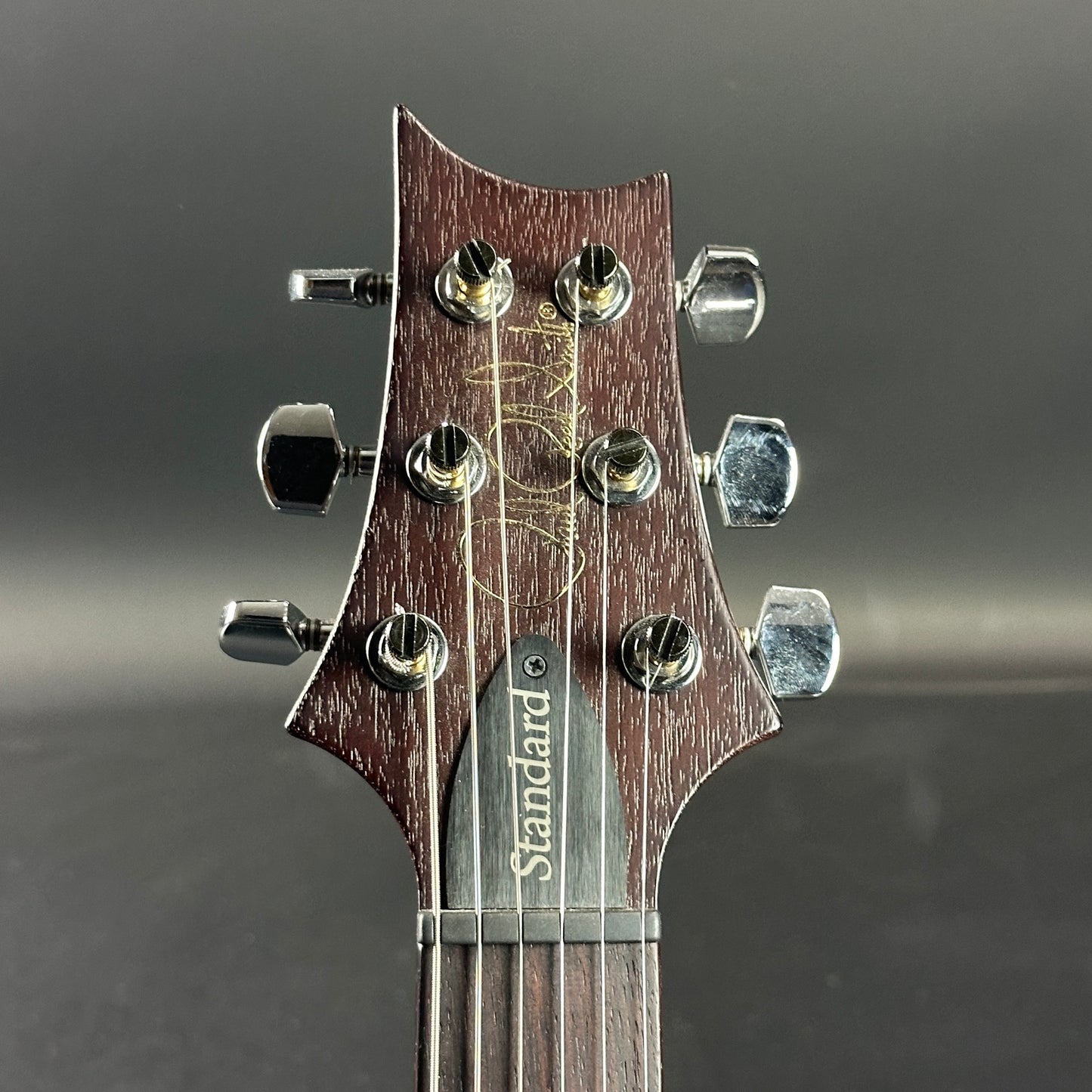 Front of headstock of Used 2023 PRS S2 Standard 22 Satin Tobacco Burst.