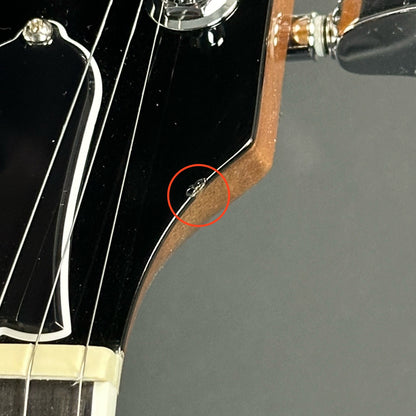 Ding on headstock of Used Gibson Les Paul Modern Graphite.