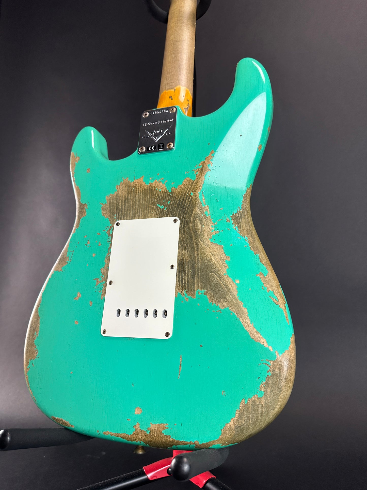 Back angle of Used Fender Custom Shop Dual Mag II Strat Relic Seafoam Green.