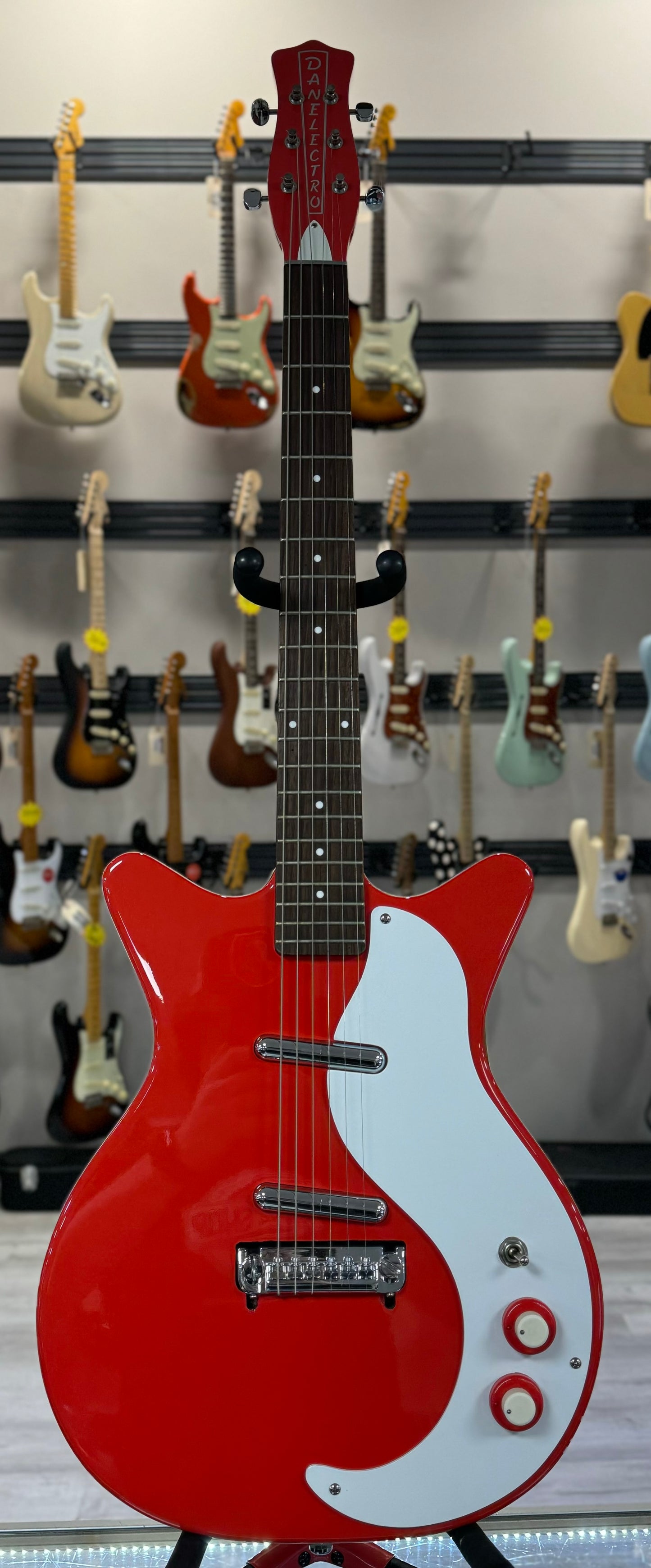 Full front of Used Danelectro 59 Coral Red