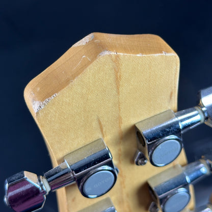 Wear on top of the headstock of Used Danelectro '56 U3 Green Sparkle.