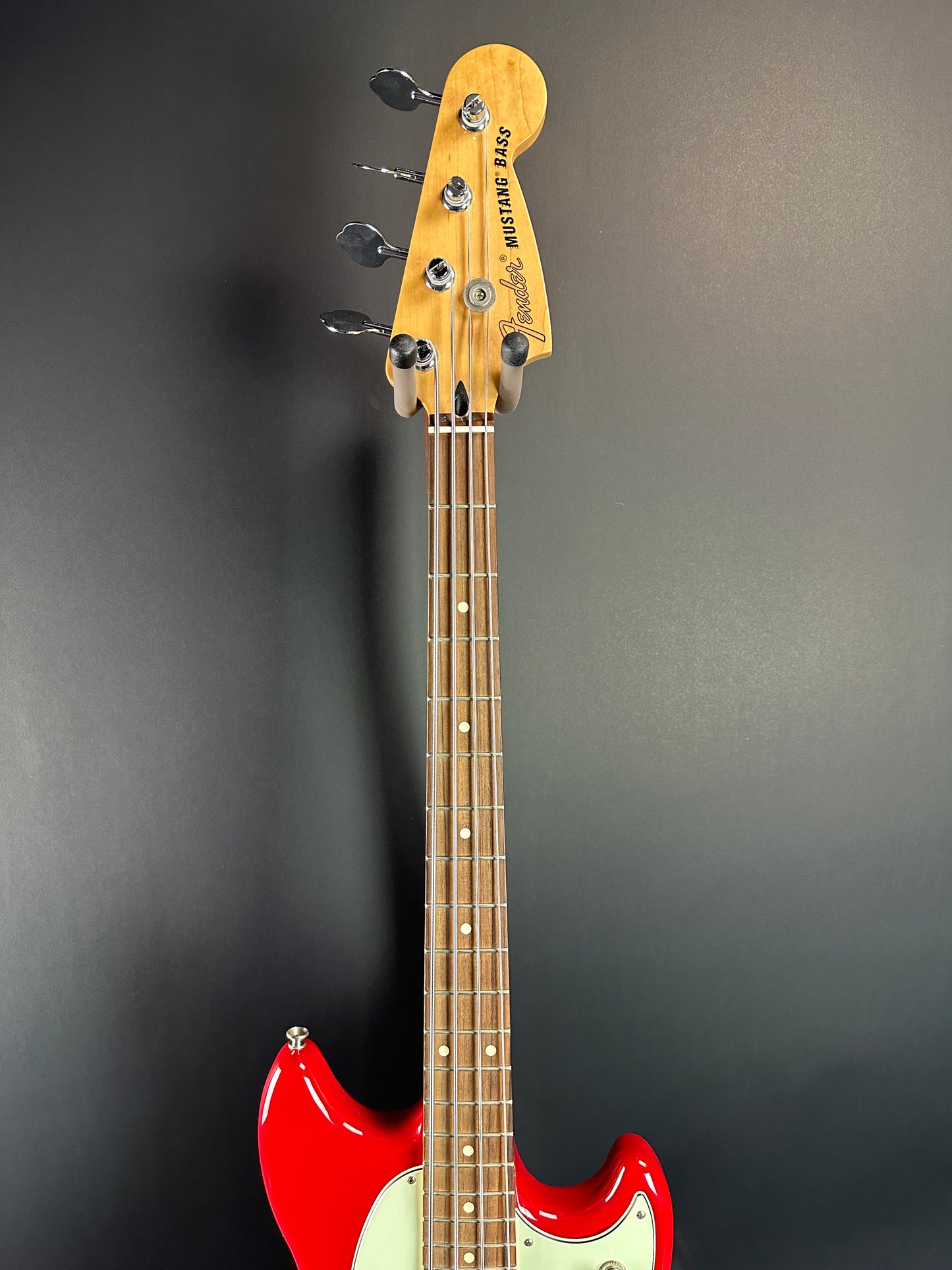 Fretboard of Used Fender Mustang PJ Bass Torino Red.