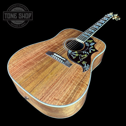 Front angle of Gibson Custom Shop M2M All Koa Hummingbird Gold Hardware Grover Tulips.