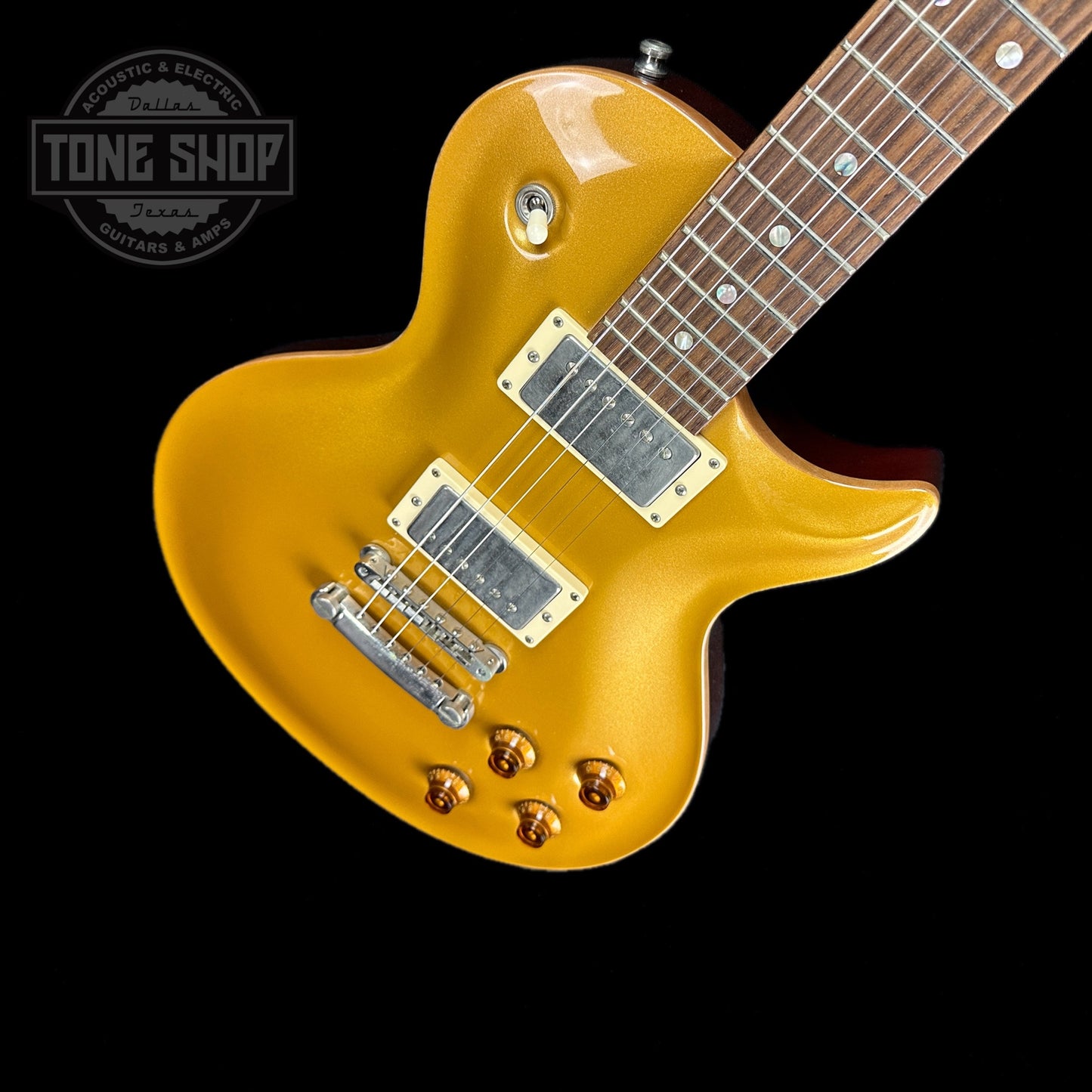 Front angle of Used Nik Huber Orca Gold Top.