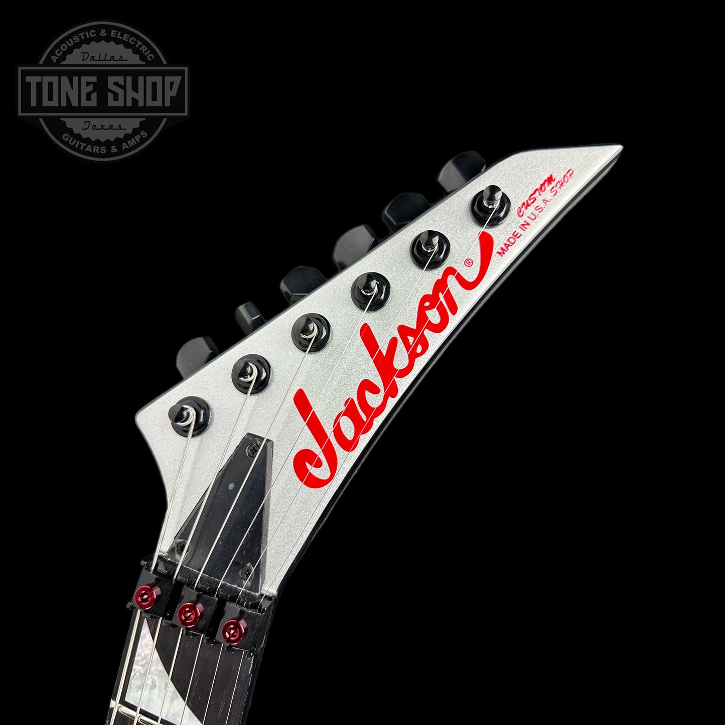 Front of headstock of Jackson Custom Shop KE 2H FRU ORION SILVER.