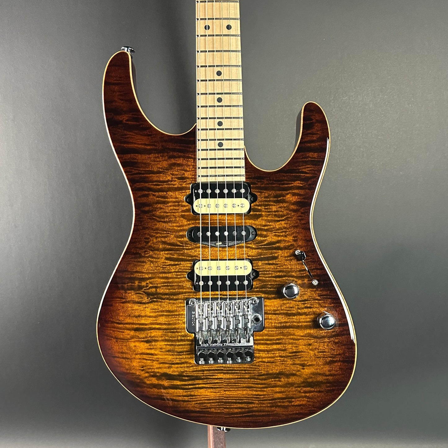 Front of Used 2015 Suhr Modern Pro Flame Top HSH Floyd Rose.