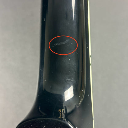 Mark on back of neck of Used Gibson Les Paul Custom Ebony.