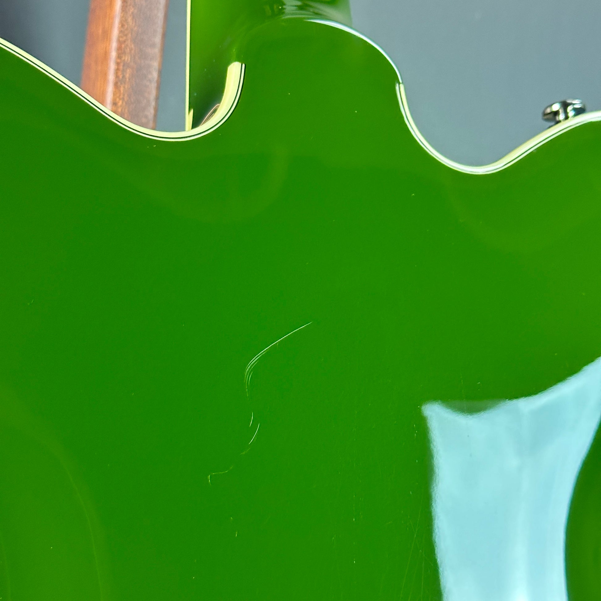 Scratch on back of Used Gretsch G2622T Torino Green.