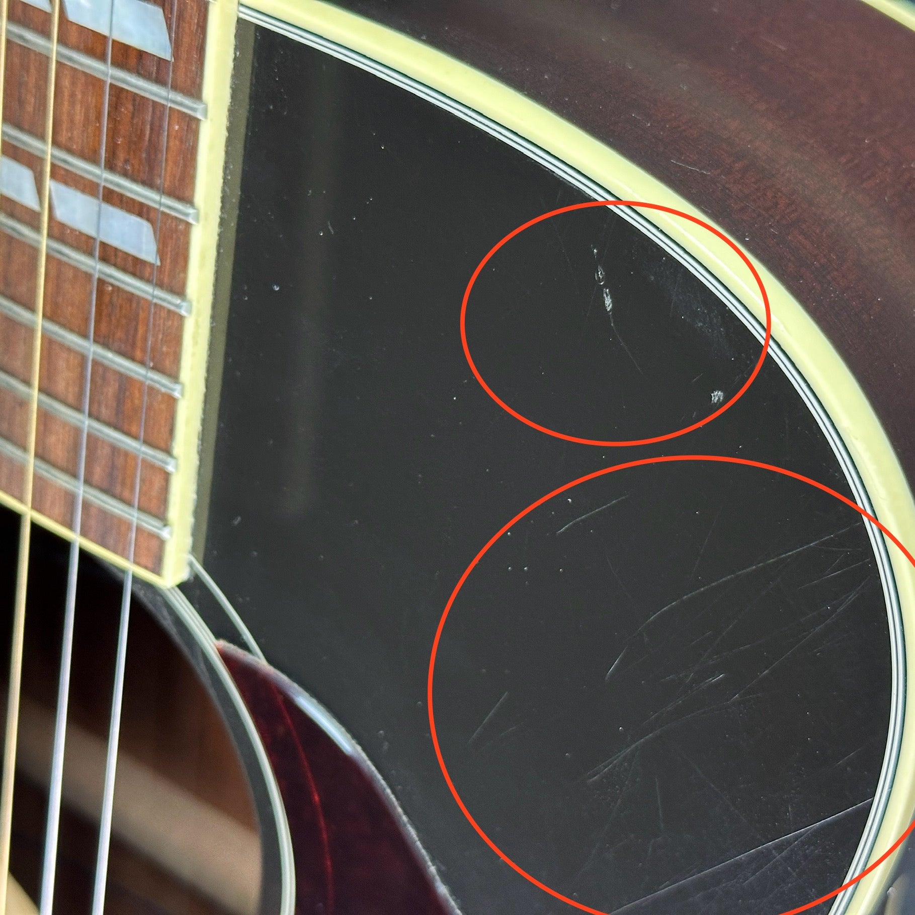 Scratches on body of Used Gibson Hummingbird Pro.