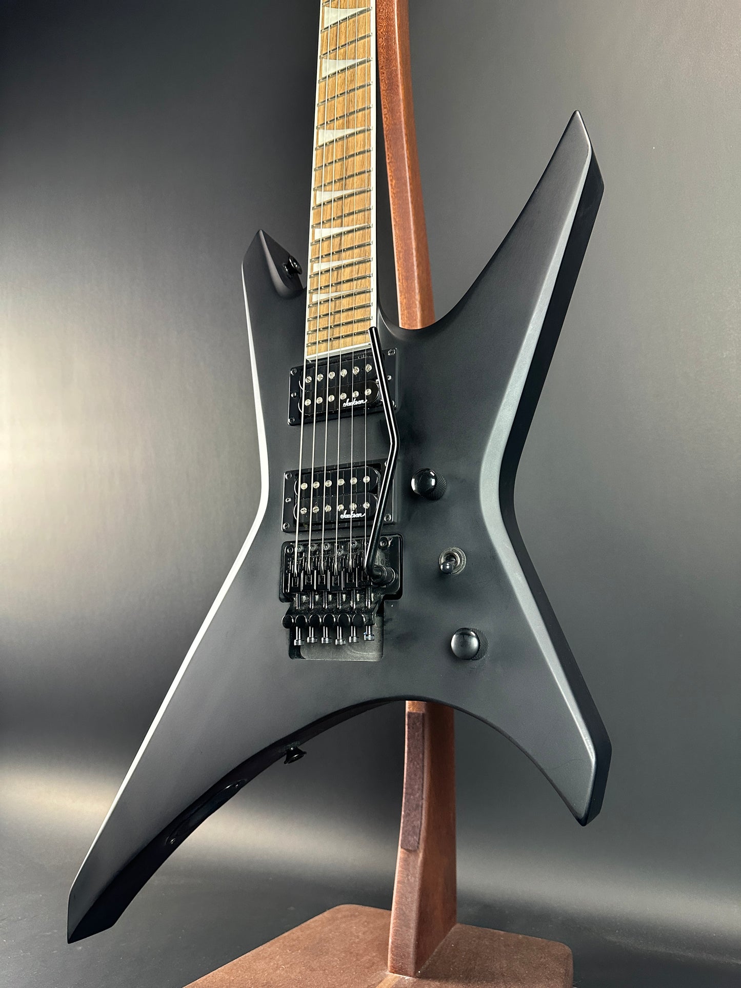 Front angle of Used Jackson WRX24 Warrior Black.