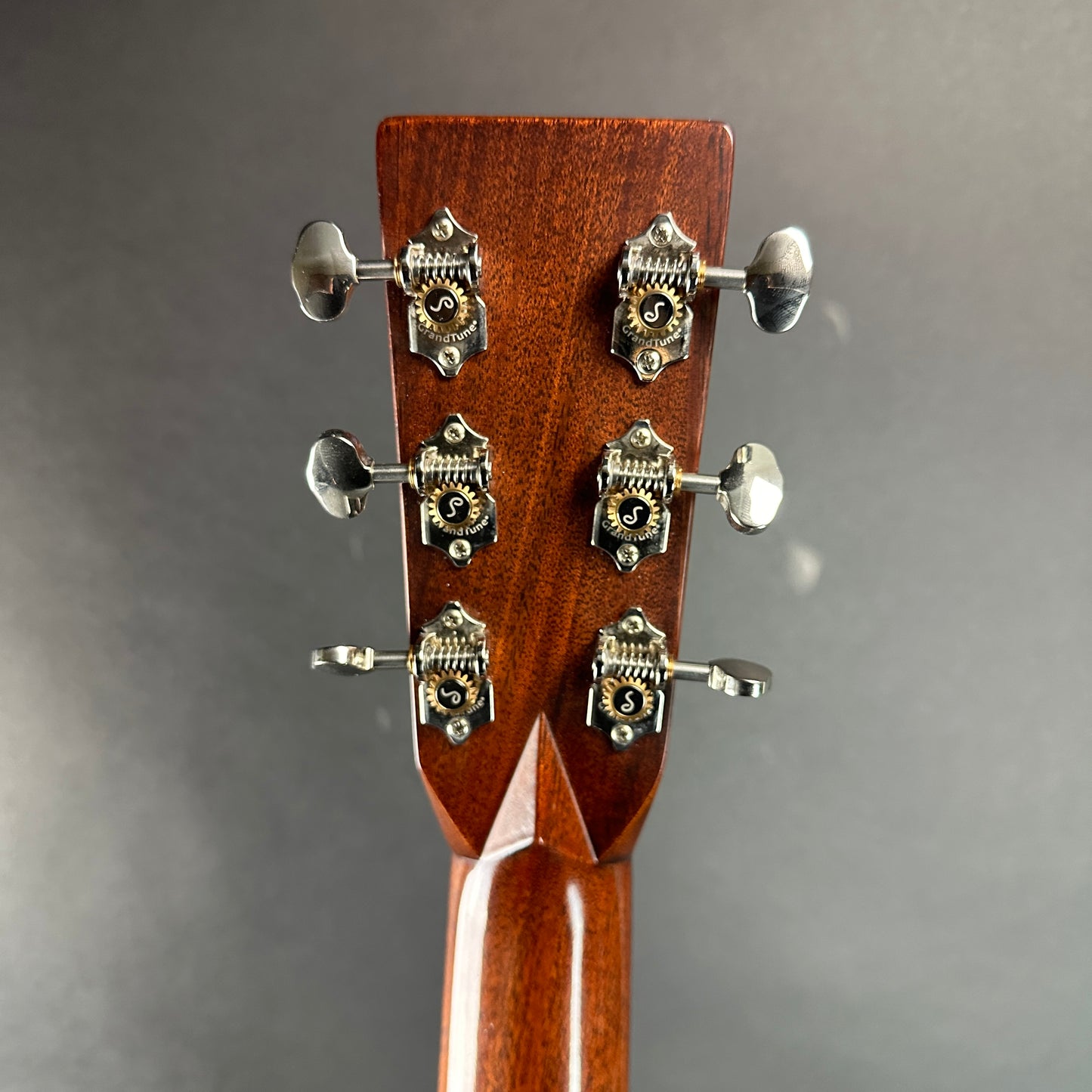 Back of headstock of Used Martin 00-28 Natural.