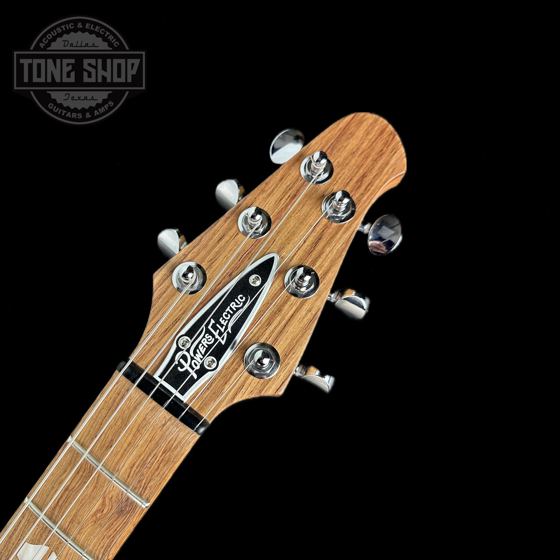 Front of headstock of Powers Electric A-Type Crayon Gray FF42 Pearl Ebony Cool CamTail.