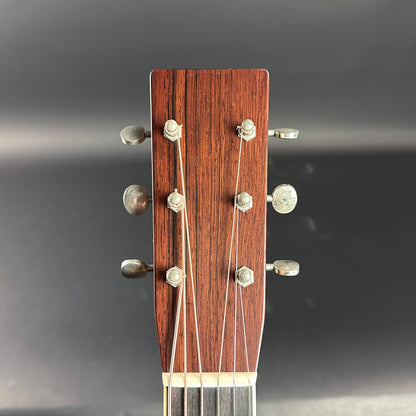 Front of headstock of Used Bourgeois Panama Red OM Large Soundhole Aged Adirondack.