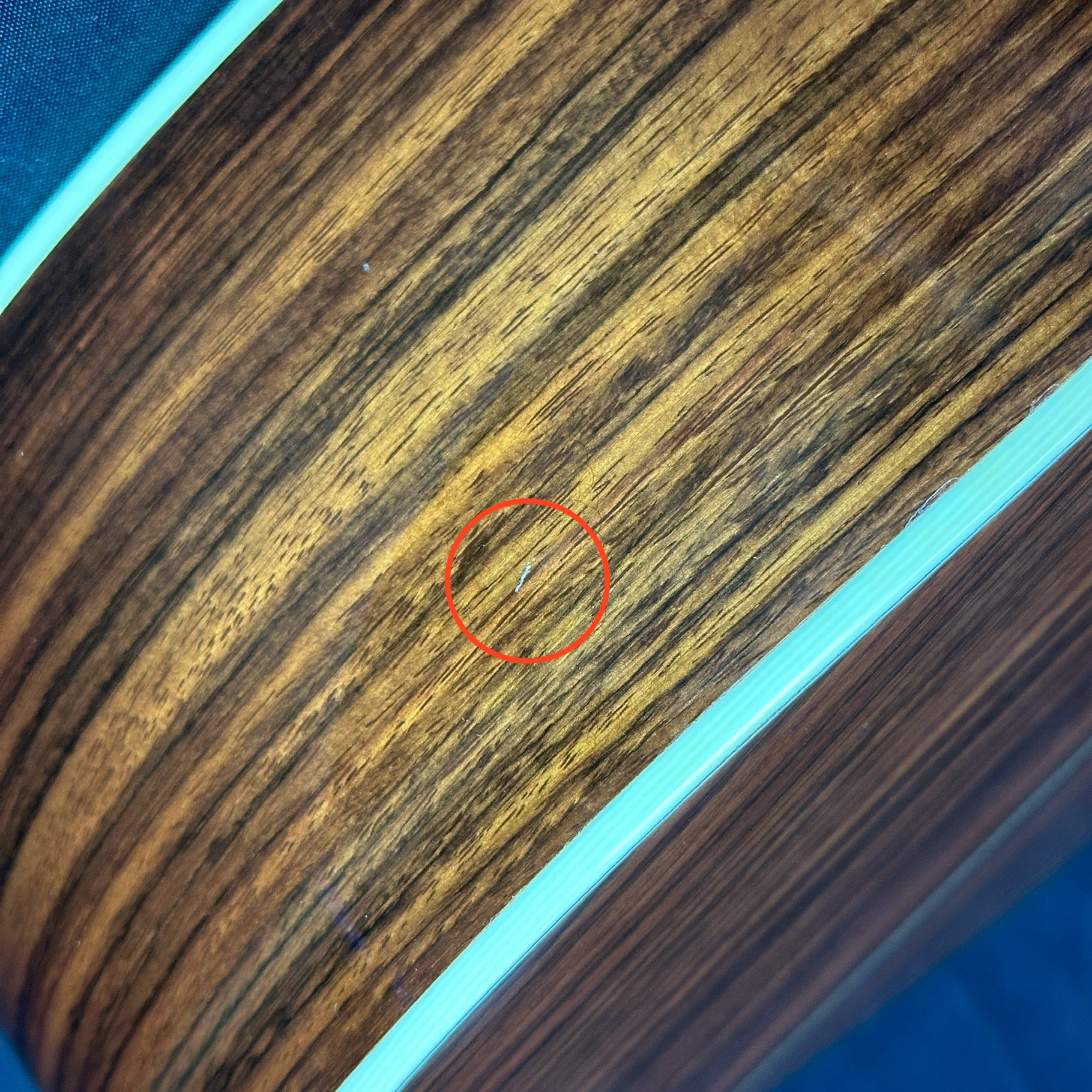 Small ding on side of Used Martin HD-28V.