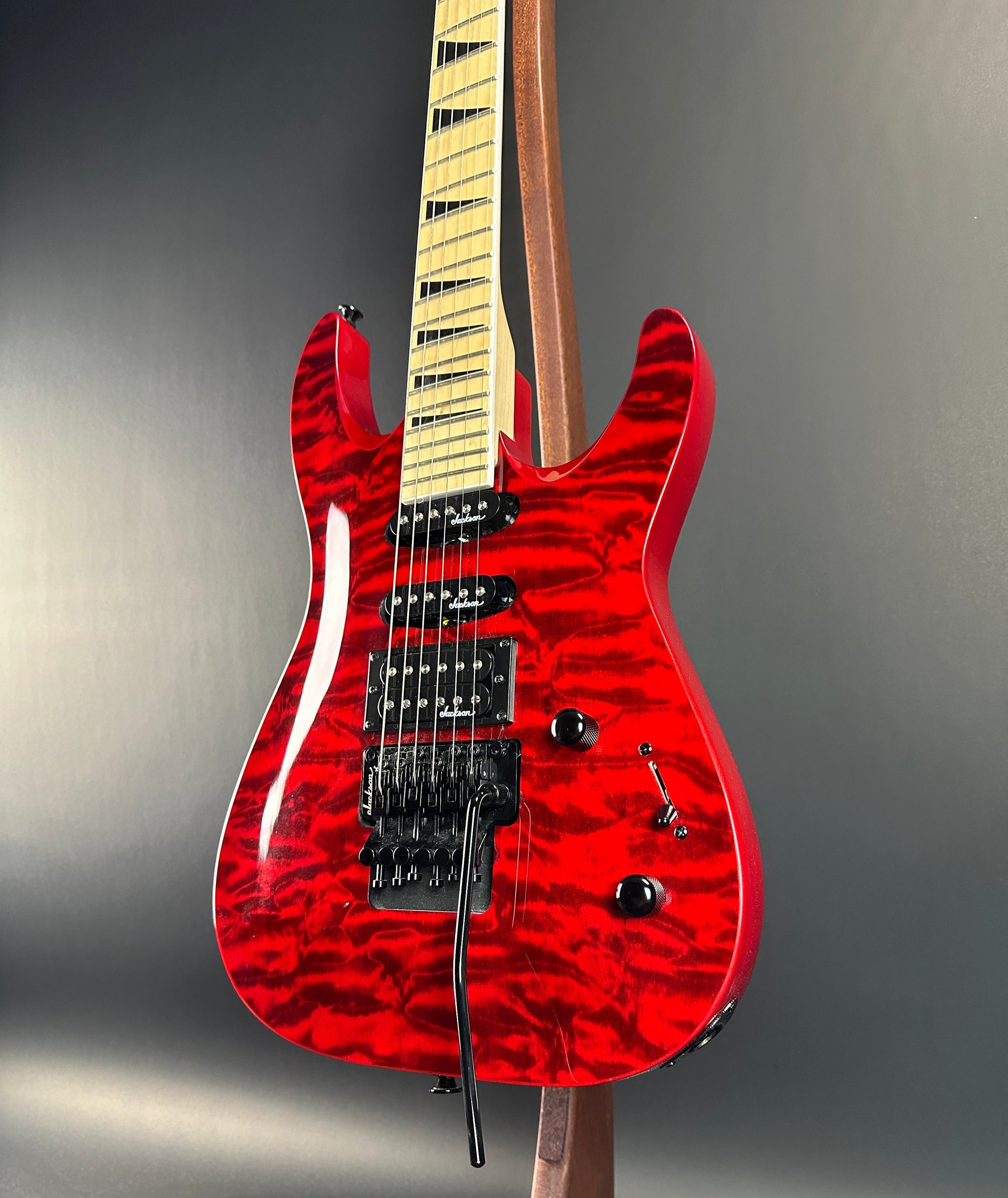 Front angle of Used Jackson JS34Q Red.