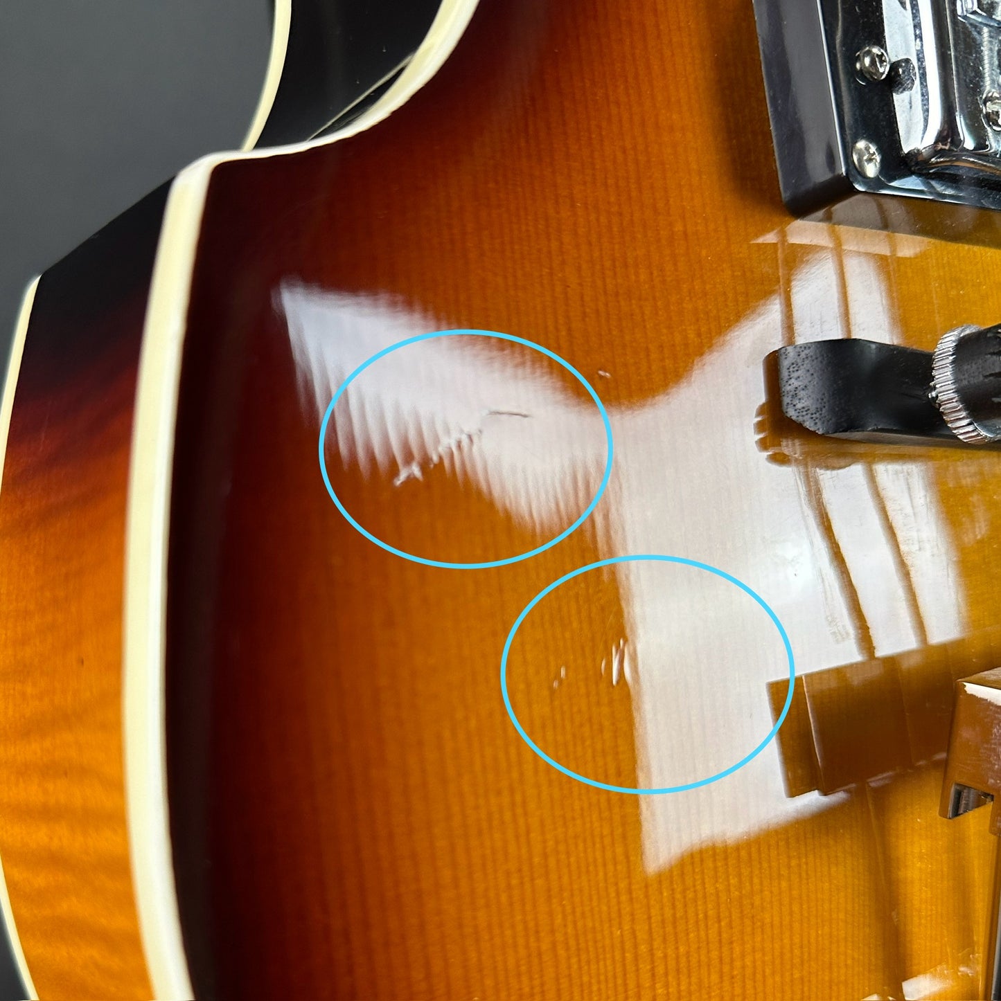 Damage near bridge of Used Hofner Icon Sieries D-Bass Sunburst.