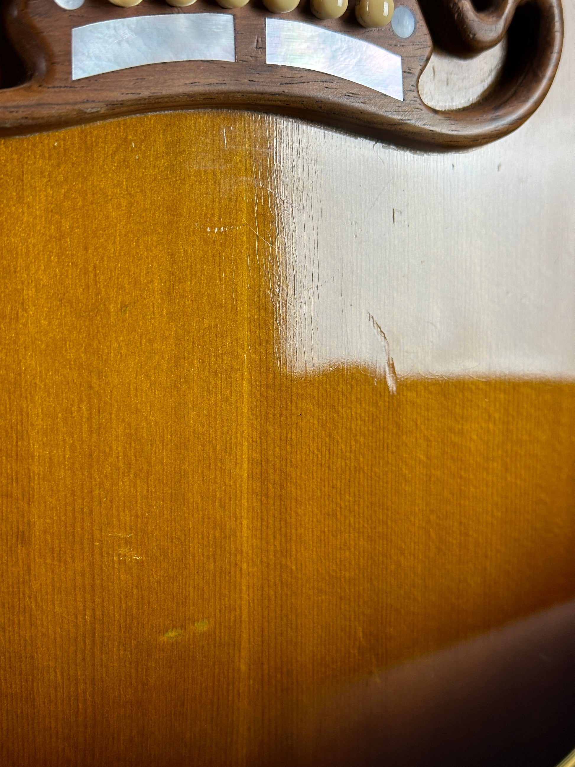 Mark under bridge of Vintage 1954 Gibson SJ-200 Sunburst.