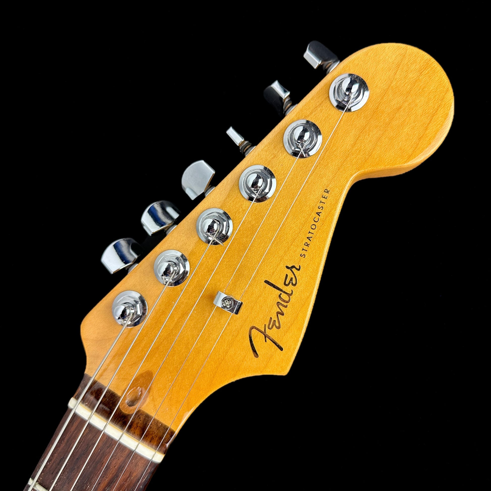 Front of headstock of Used Fender Ultra Stratocaster Ultraburst.