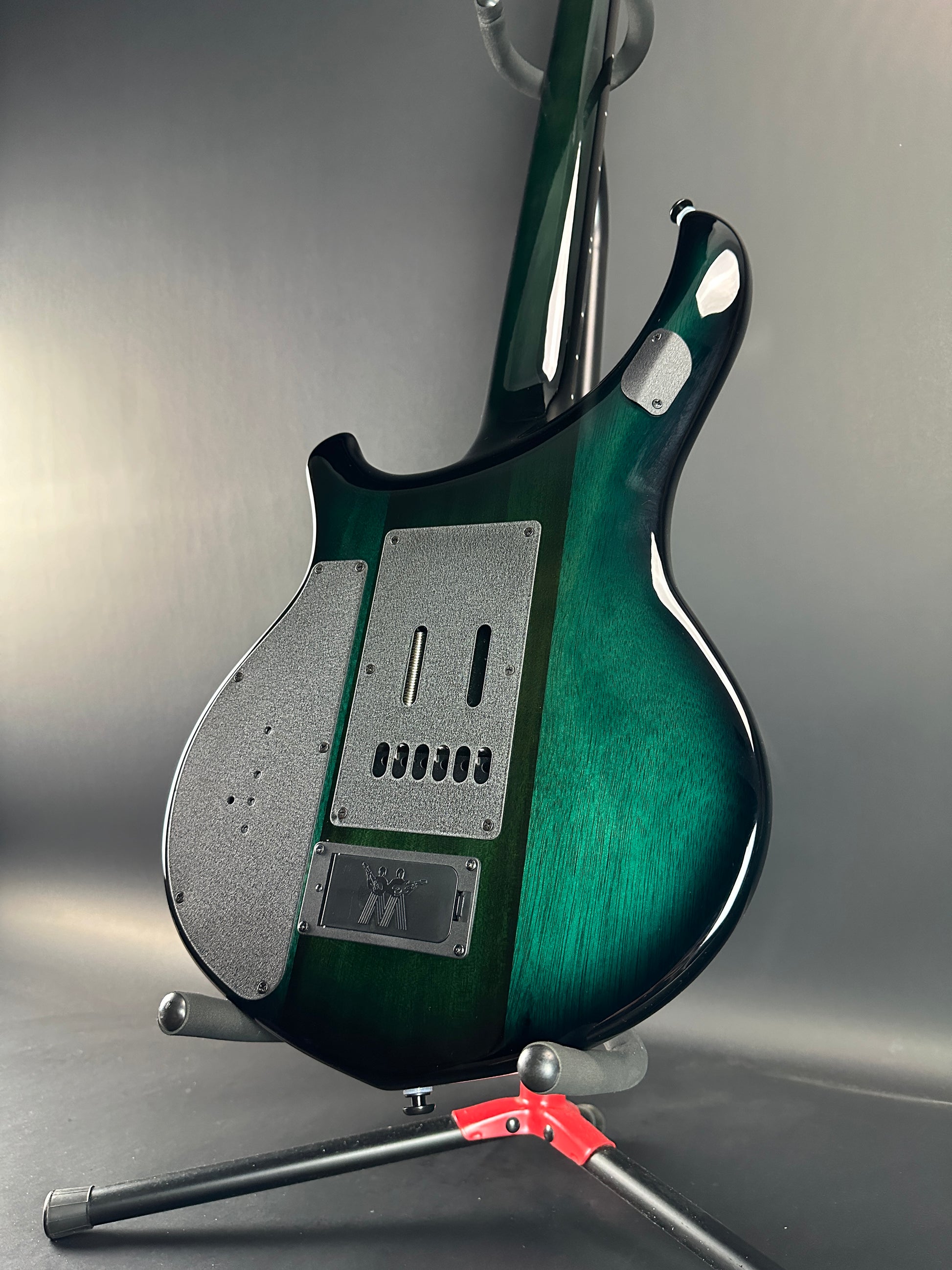 Back angle of Used Ernie Ball MusicMan Majesty 6 John Petrucci Gravity Green.