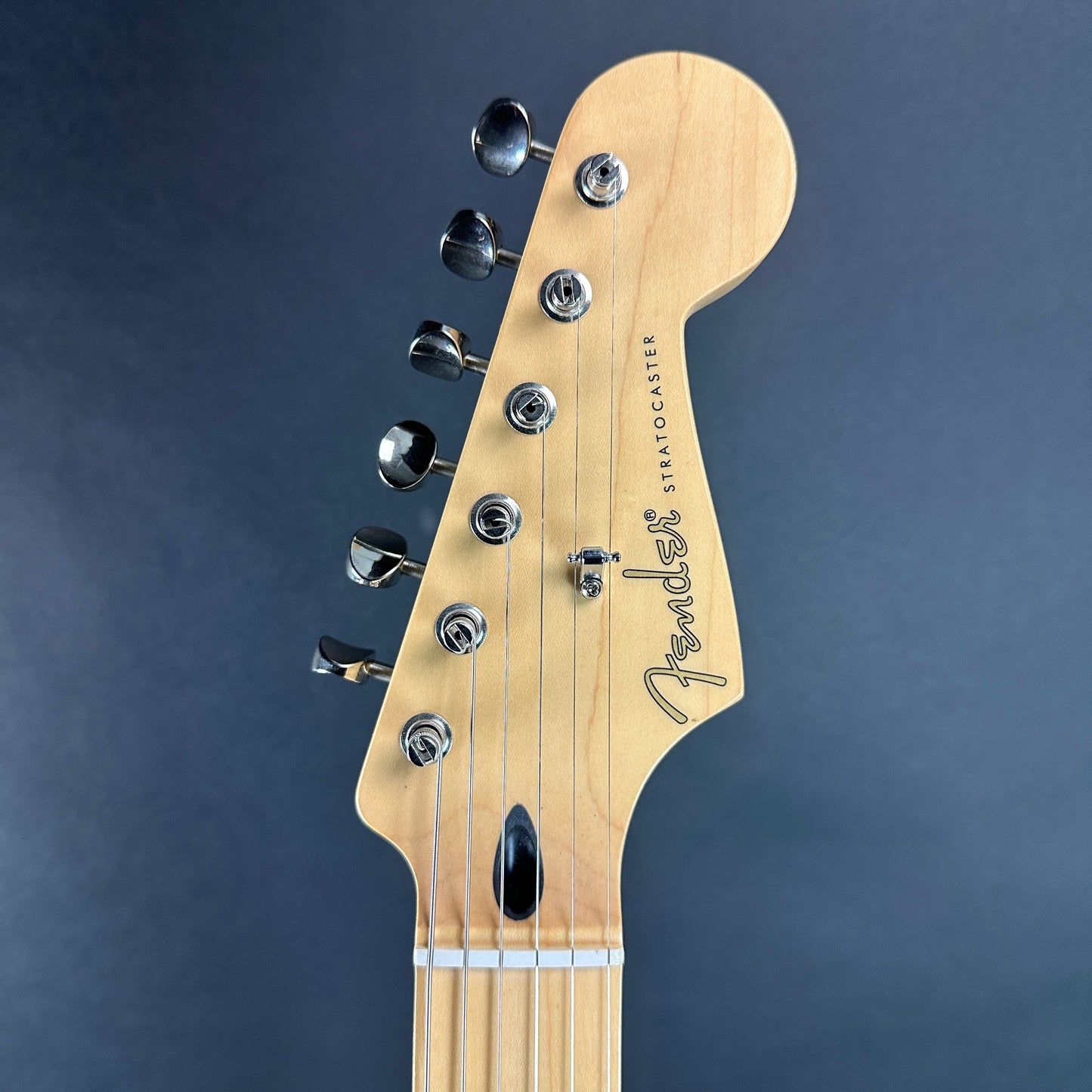 Front of headstock of Used Fender Jimmie Vaughan Tex-Mex Strat.