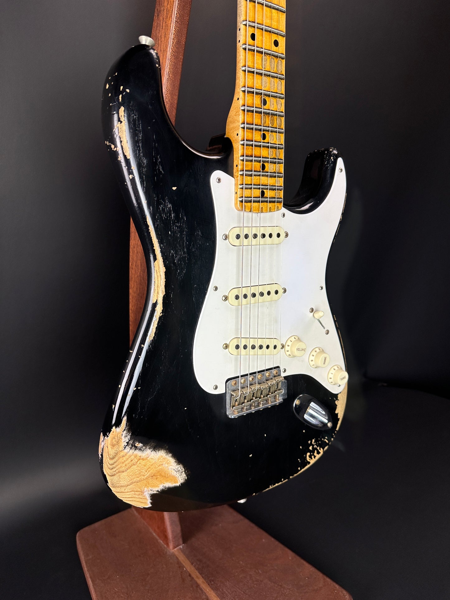 Front angle of Used Fender Custom Shop '57 Stratocaster Relic Black.