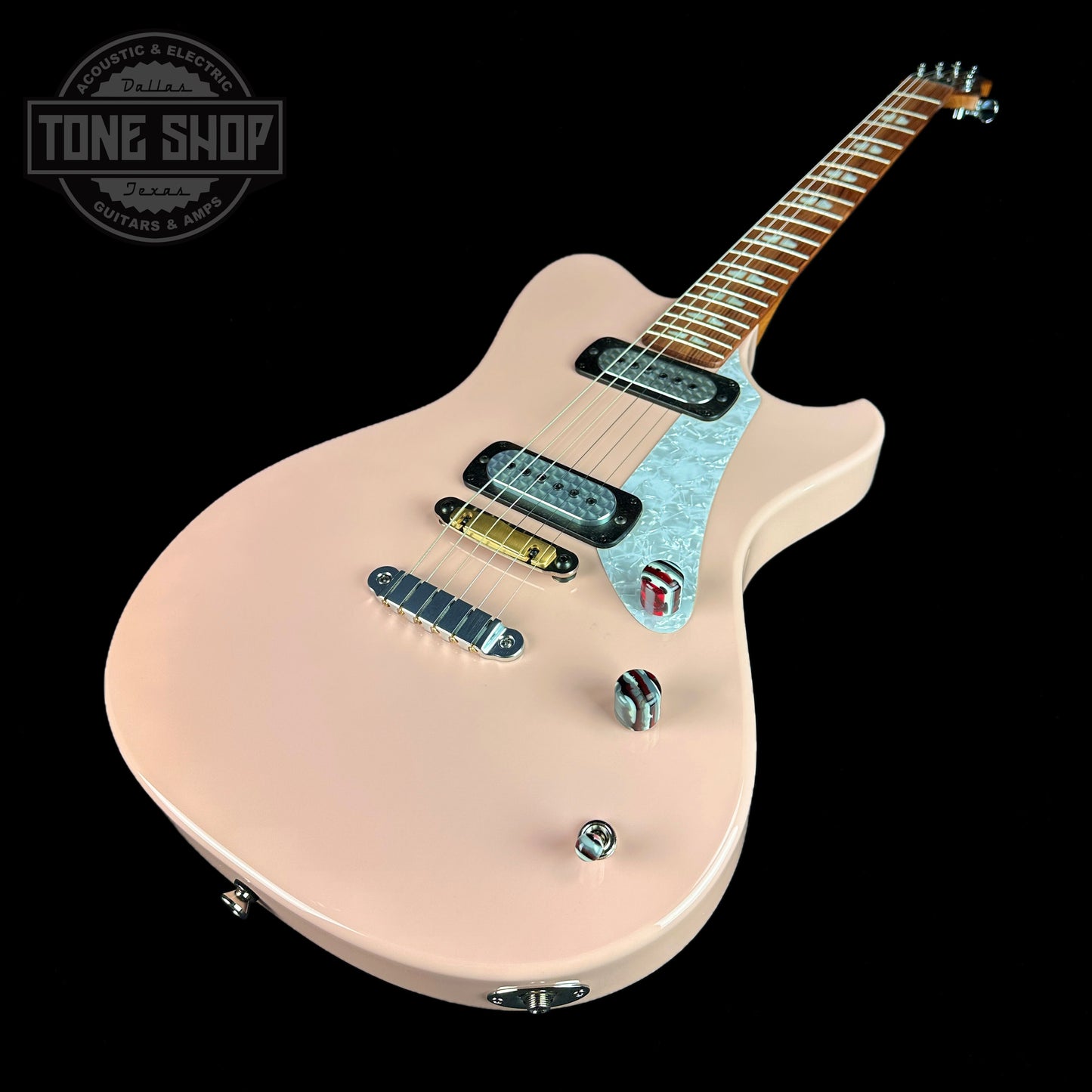 Front angle of Powers Electric A-Type Cochon PInk PF42 Pearl Brass Neutral Hard Tail.