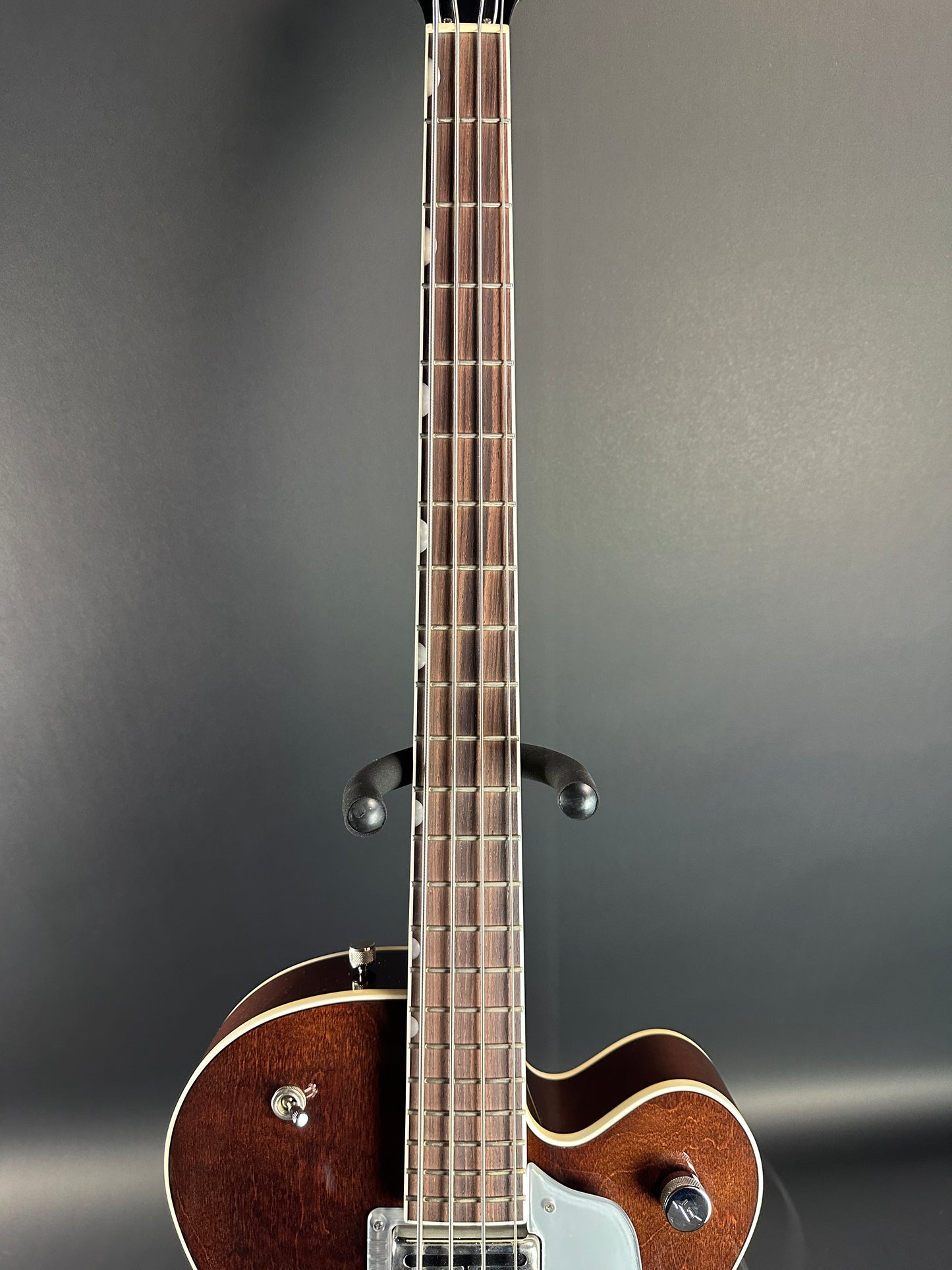 Fretboard of Used Gretsch G6119B Walnut Broadcaster Bass.