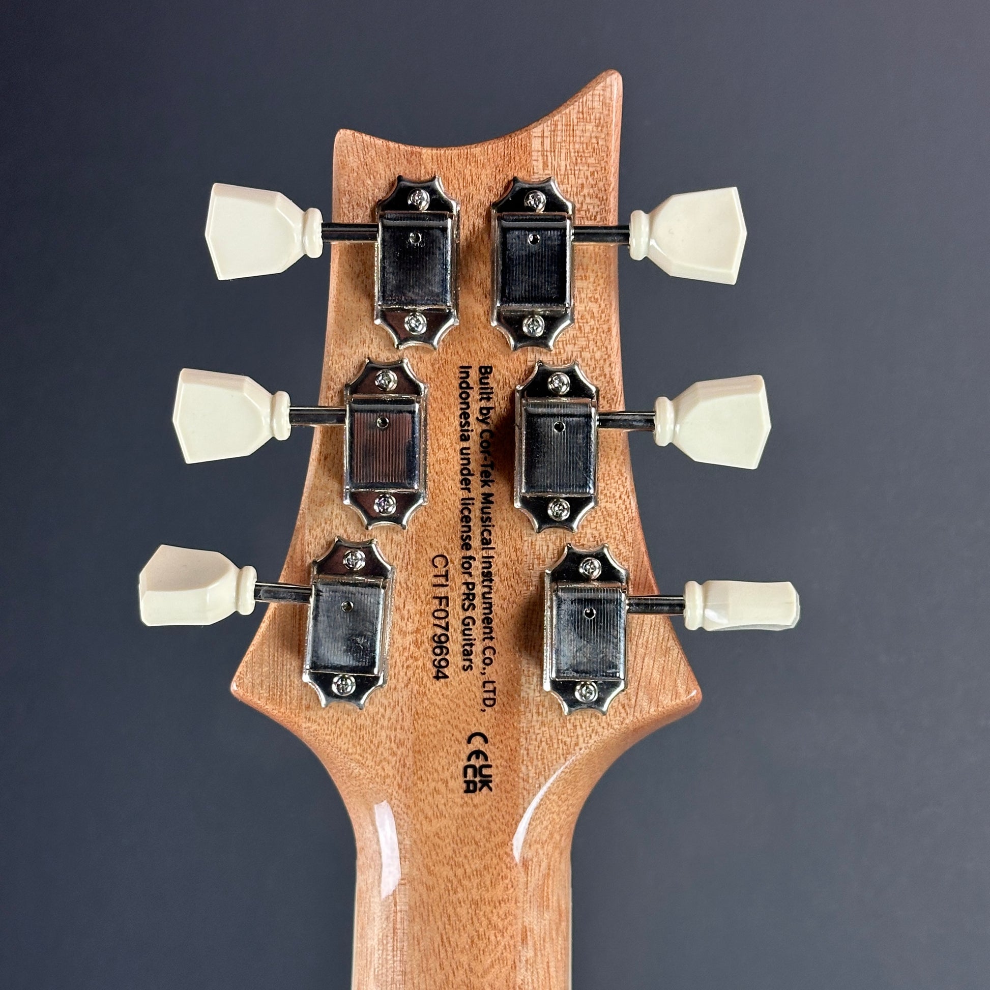 Back of headstock of Used PRS SE McCarty 594 Charcoal.