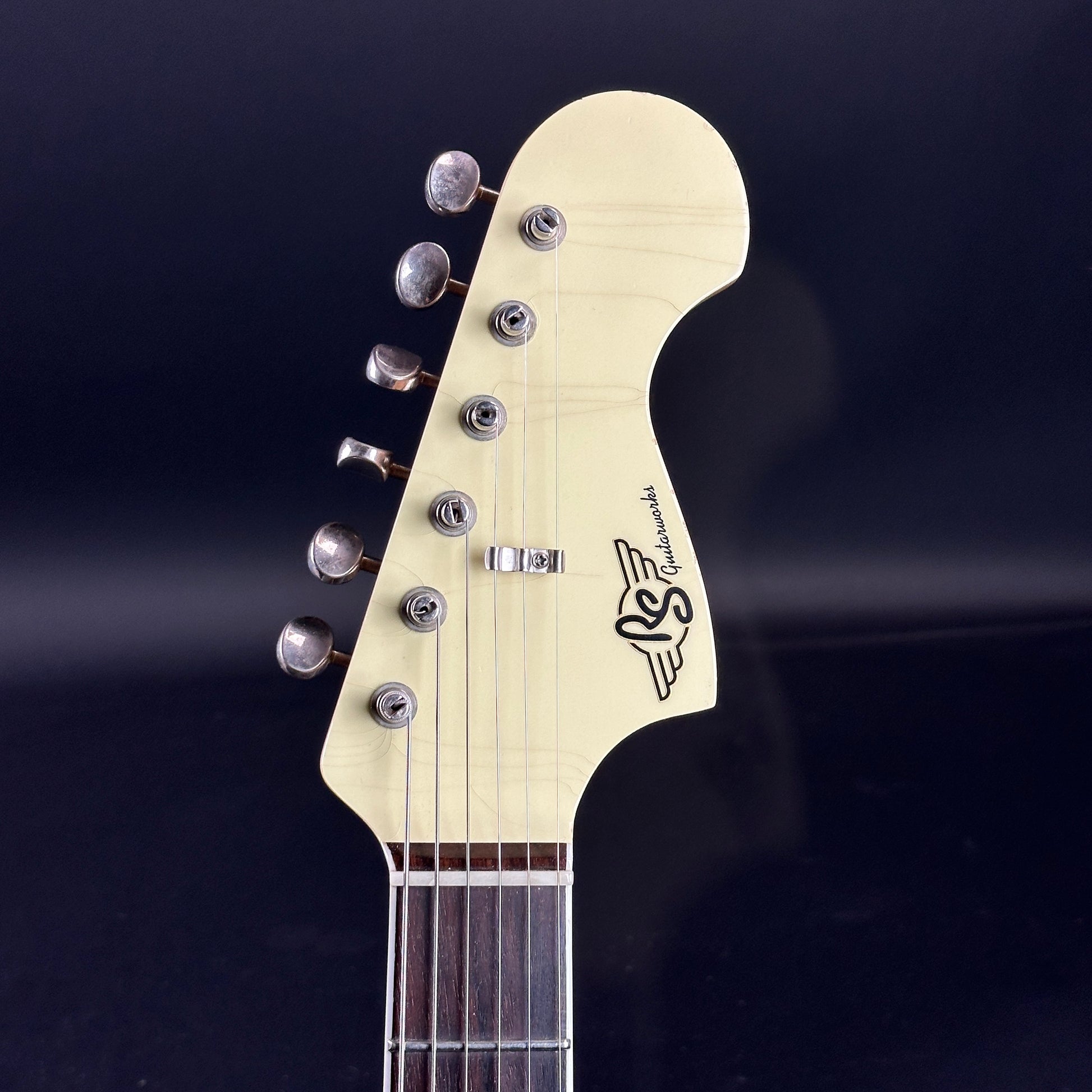 Front of headstock of Used RS Guitarworks Surfmaster 6-Speed White.