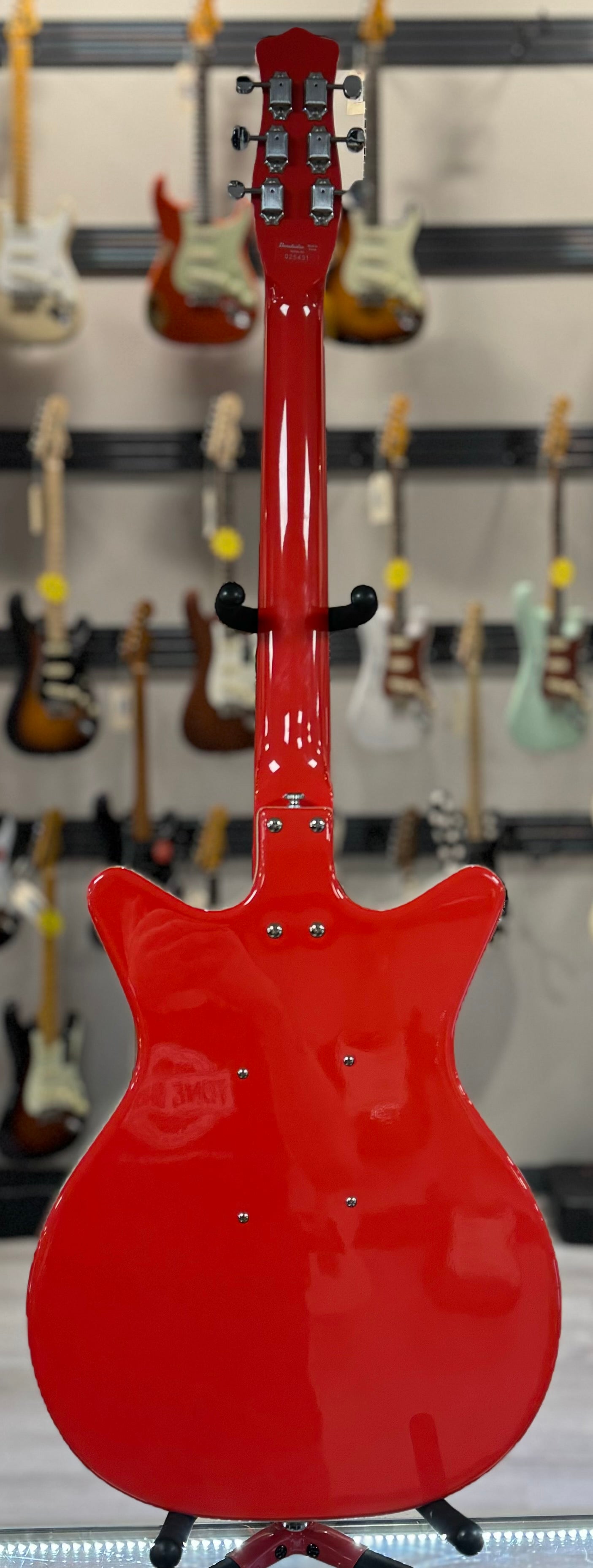 Full back of Used Danelectro 59 Coral Red