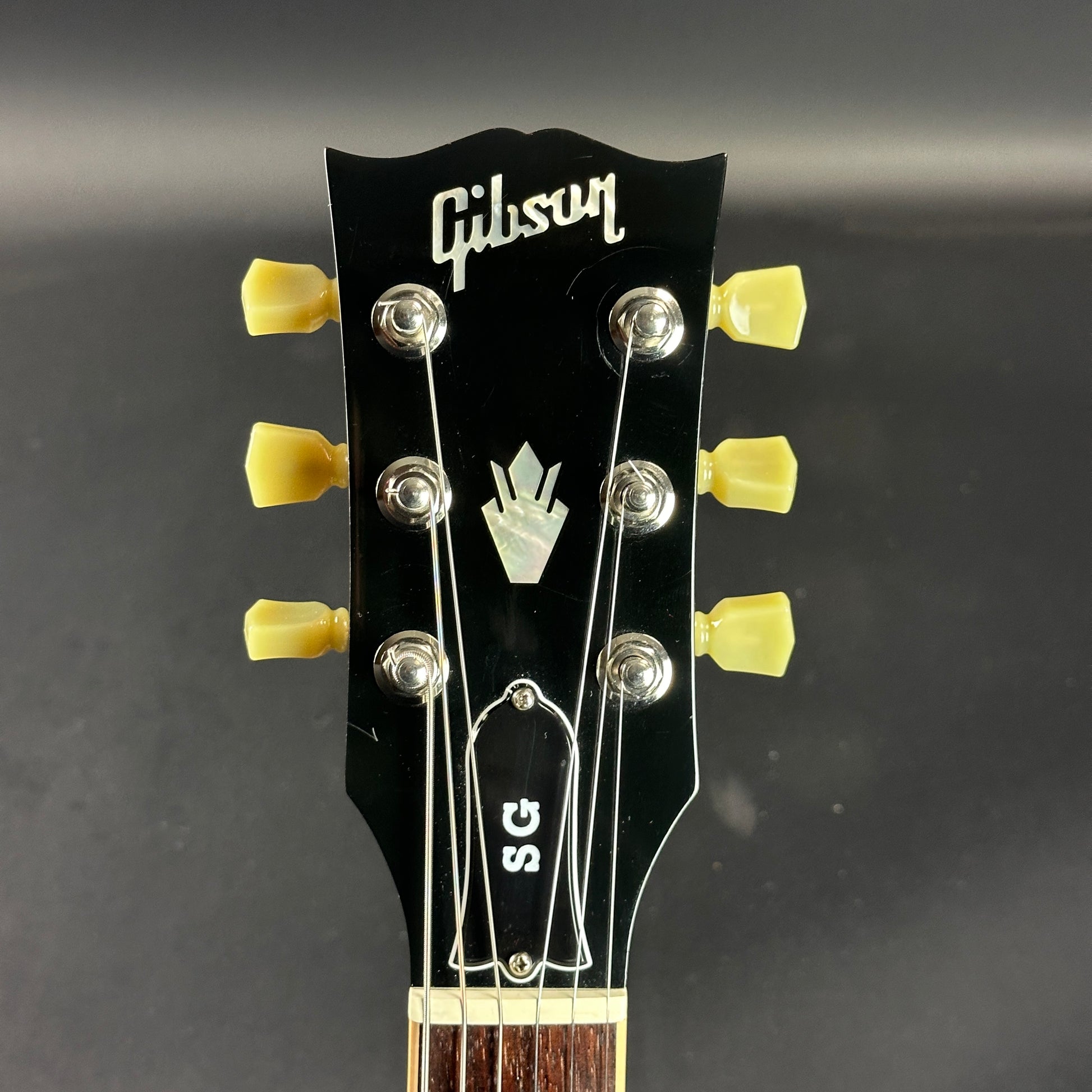 Front of headstock of Used Gibson SG Standard Cherry.