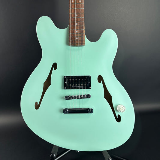 Front of Used Fender Tom Delonge Starcaster RW Satin Surf Green.