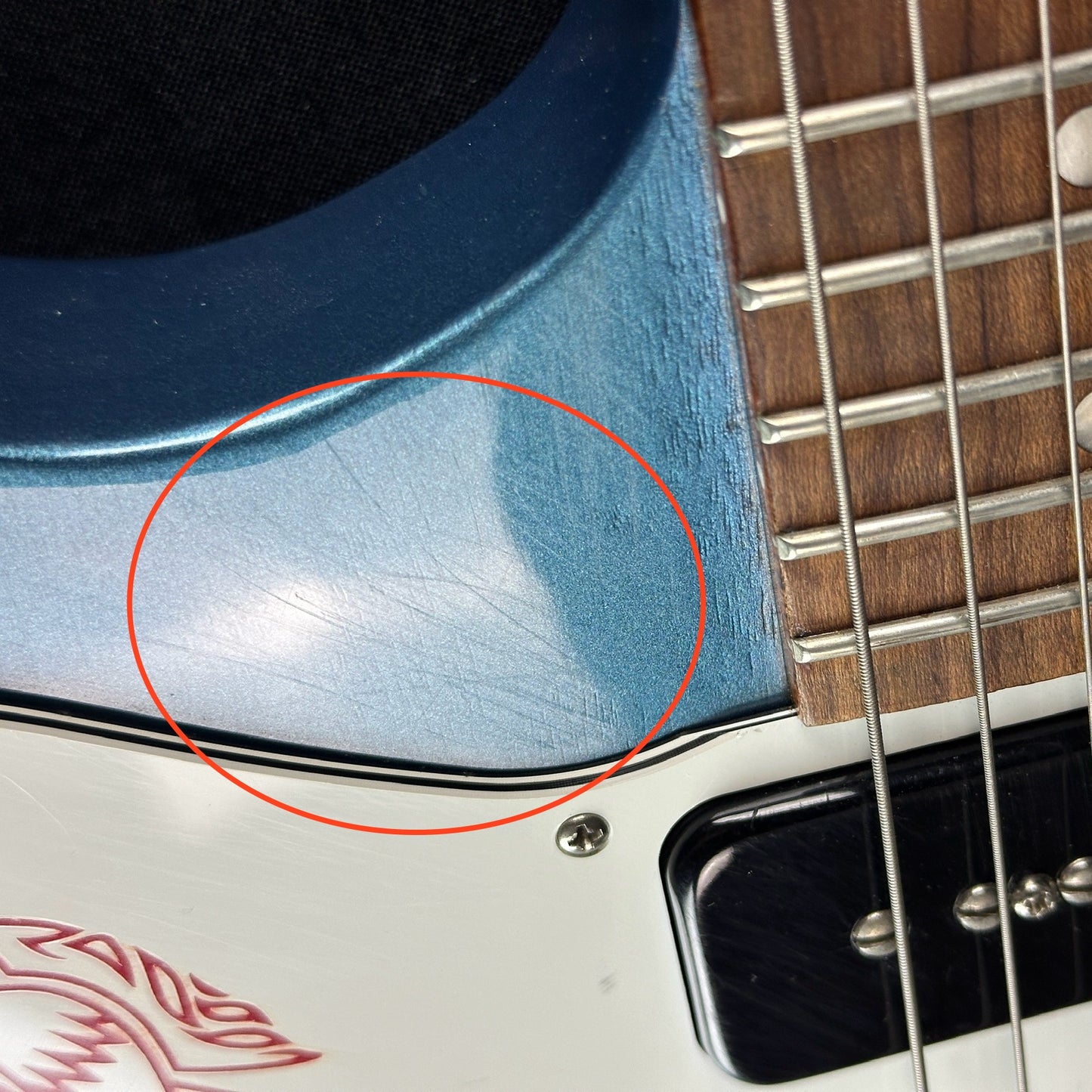 Scratches near fretboard of Used Gibson Non-Reverse Firebird Pelham Blue.