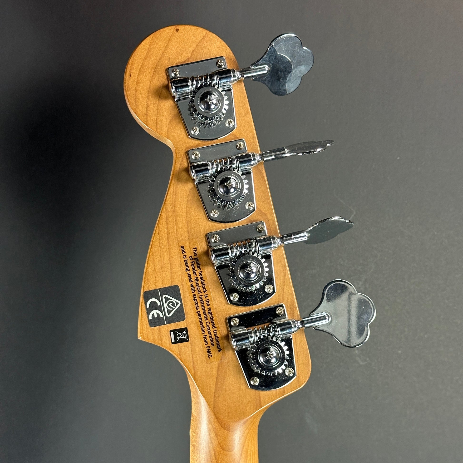 Back of headstock of Used Charvel Pro Mod Bass Blue.