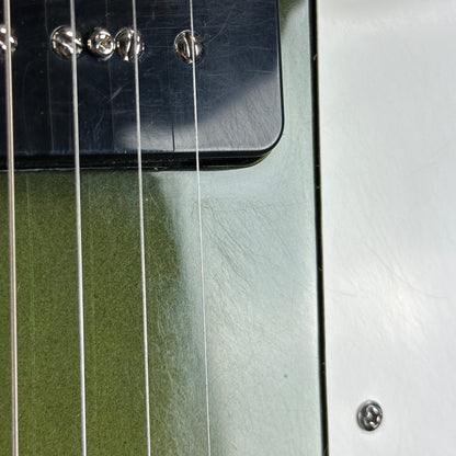 Scratches near pickups of Used Reverend Warwick DAW Avocado Burst.