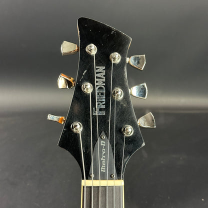 Front of headstock of Used Friedman Aged Metro D Reseda Green.