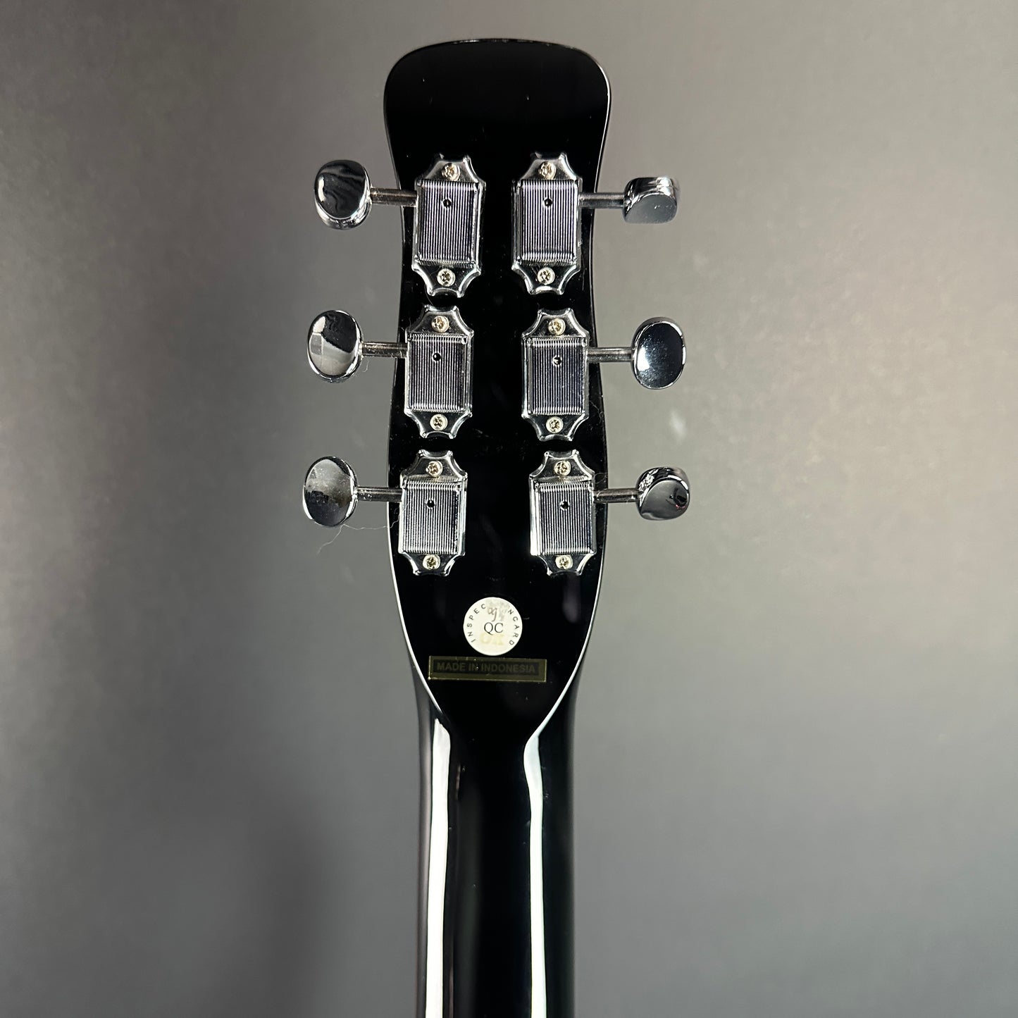 Back of headstock of Used Silvertone 1303/U2 Black.