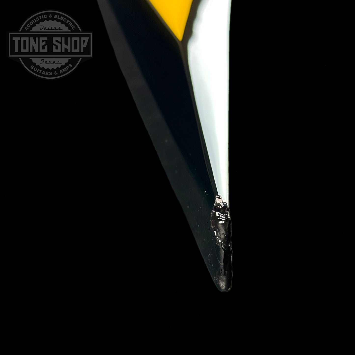 Chip on lower left horn of Used ESP Alexi Laiho Signature Black with Yellow.