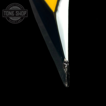 Chip on lower left horn of Used ESP Alexi Laiho Signature Black with Yellow.