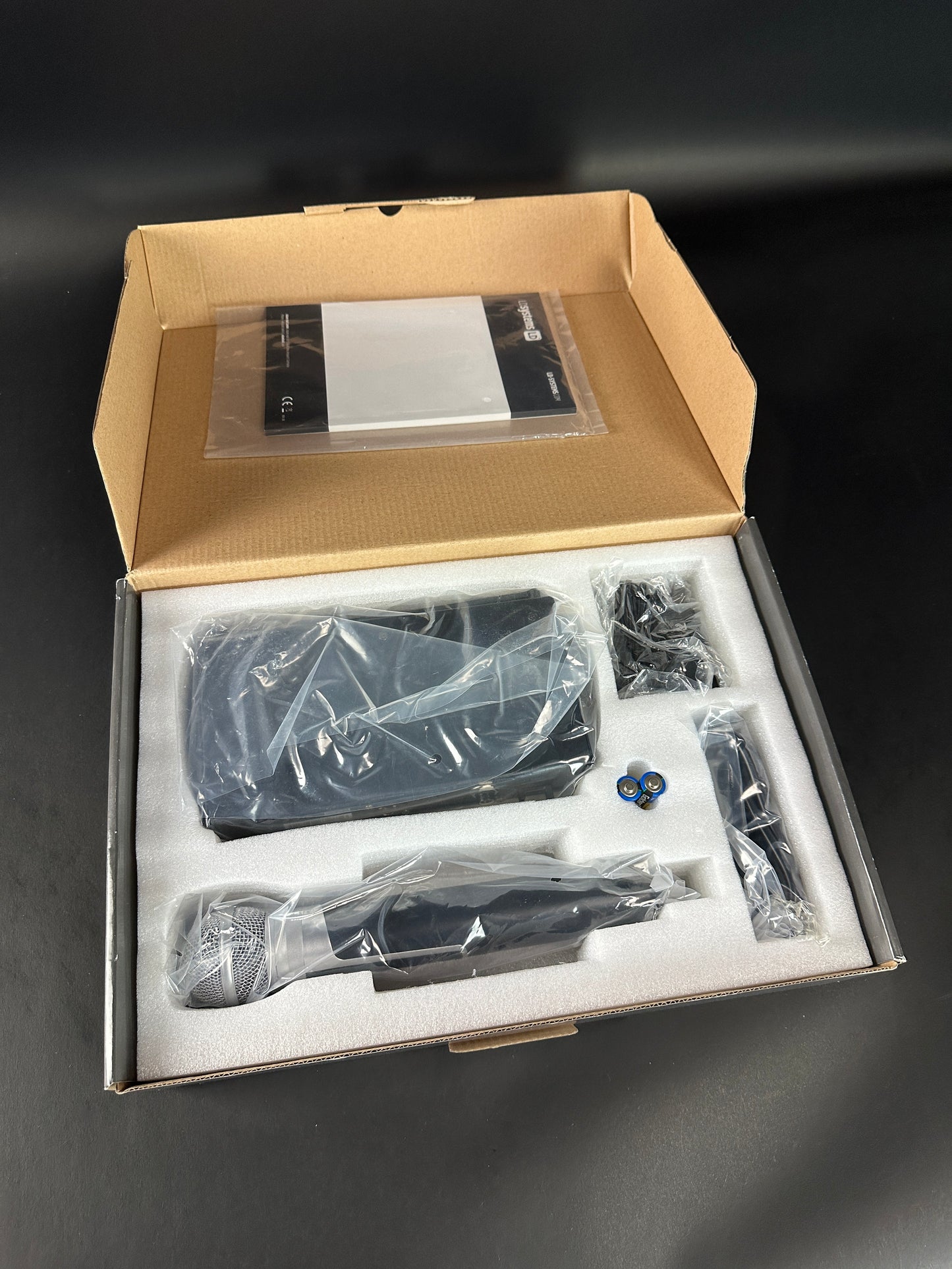 Open box displaying contents of Used LD Systems U305 HHD Wireless Microphone.